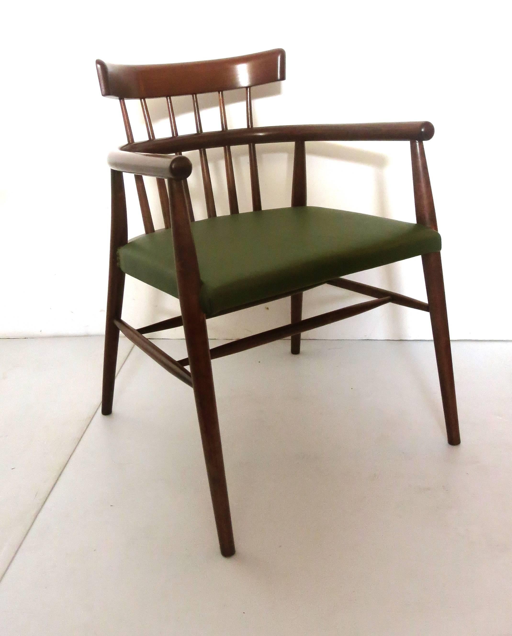 Beautiful and unique armchair, solid maple frame in a chocolate stain finish with Italian leather seat, circa 1950s the chair has been totally restored refinished and has new leather seat, its made in Sweden, solid and sturdy .