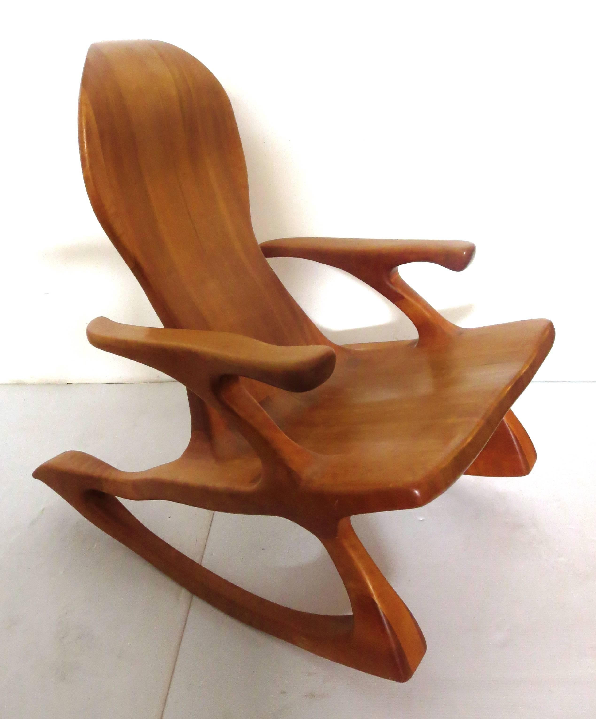 Striking American modern one piece solid cherrywood handcrafted rocker, made by Texas craftsman  by Kevin DesPlanques , incredible piece well made solid sturdy and comfy.