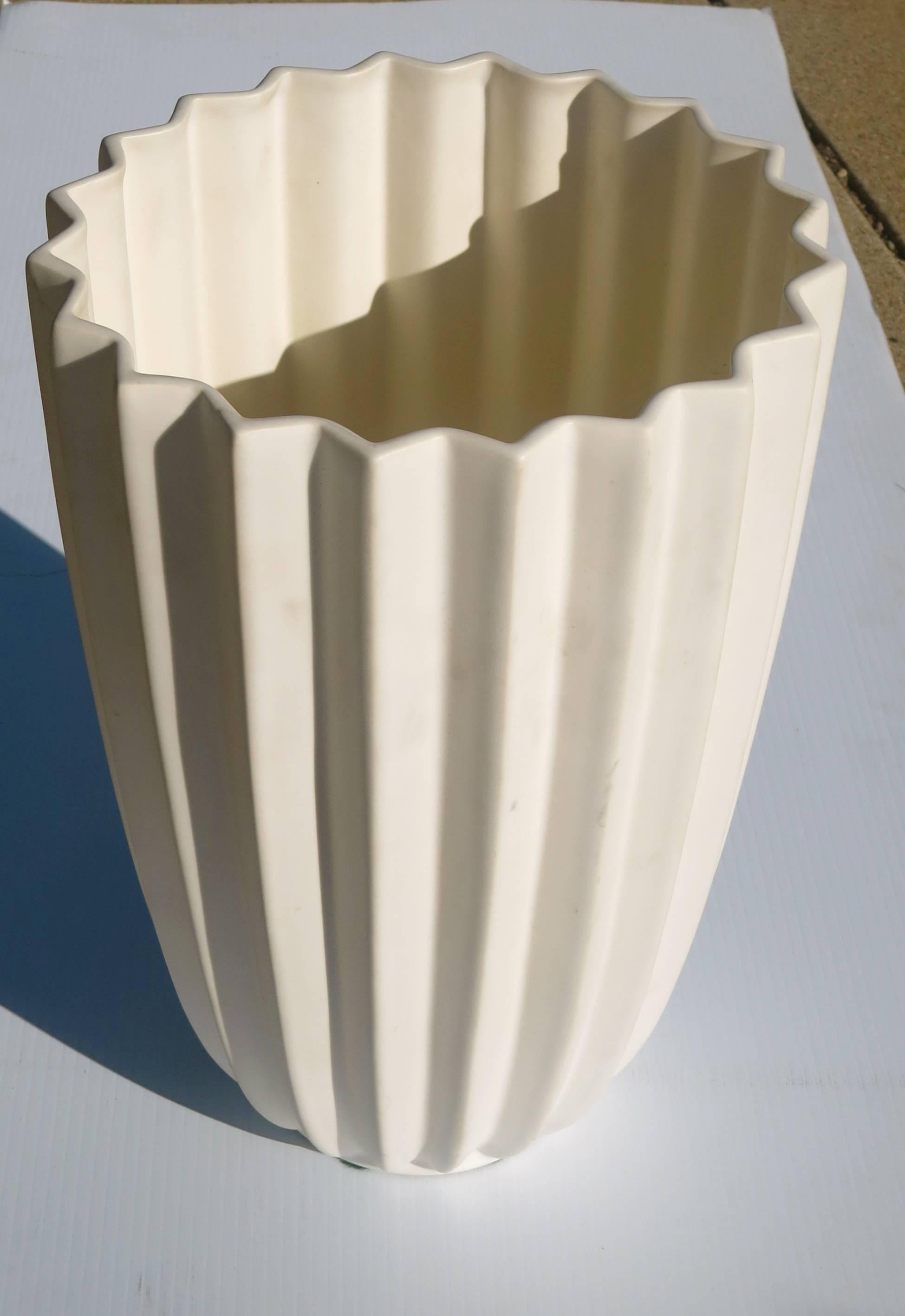 Elegant tall mate white ceramic vase, circa 1990s made in France by Fainciere de Charolles for Roche Bobois, excellent condition no chips or cracks, great as a center piece.