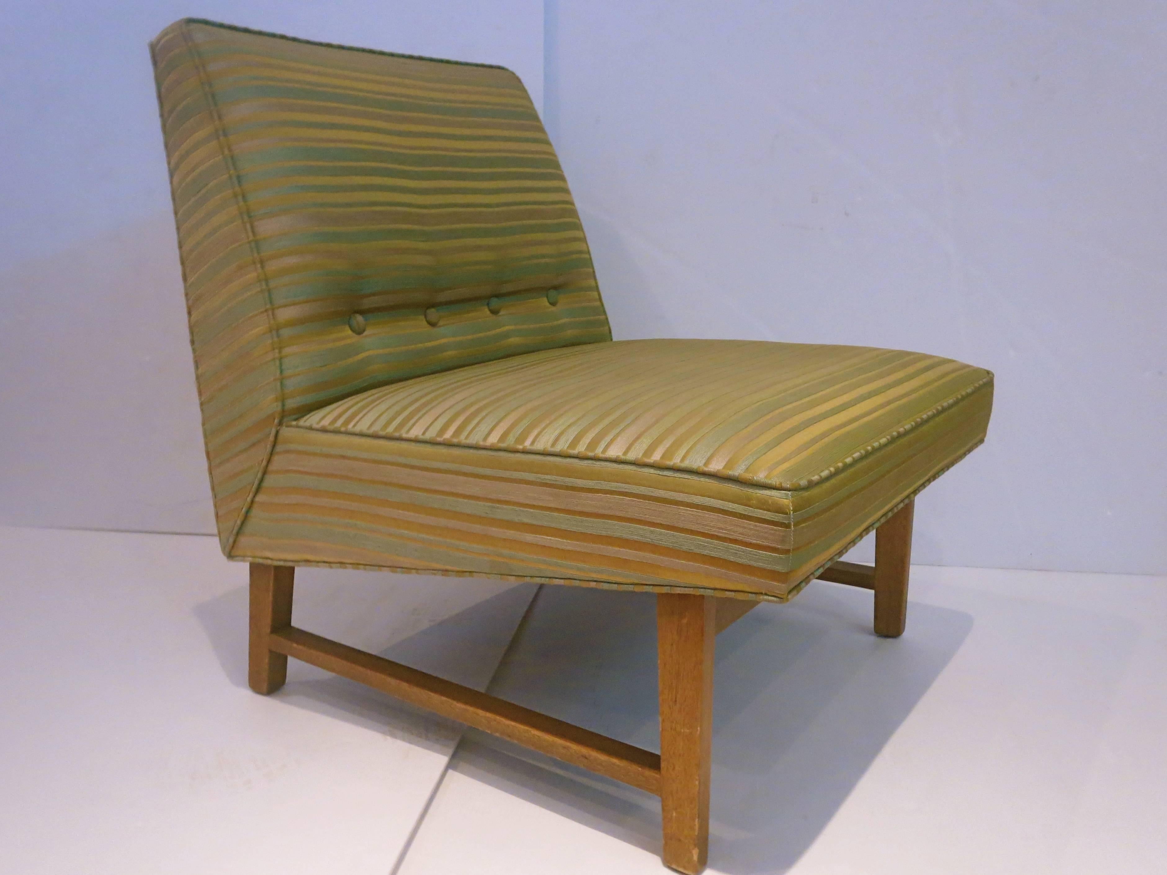 A hard to find single slipper chair designed by Edward Wormley for Dunbar, circa 1950s all original condition fabric and solid mahogany base, solid and sturdy all original fabric and finish very clean for its age beautiful material.
