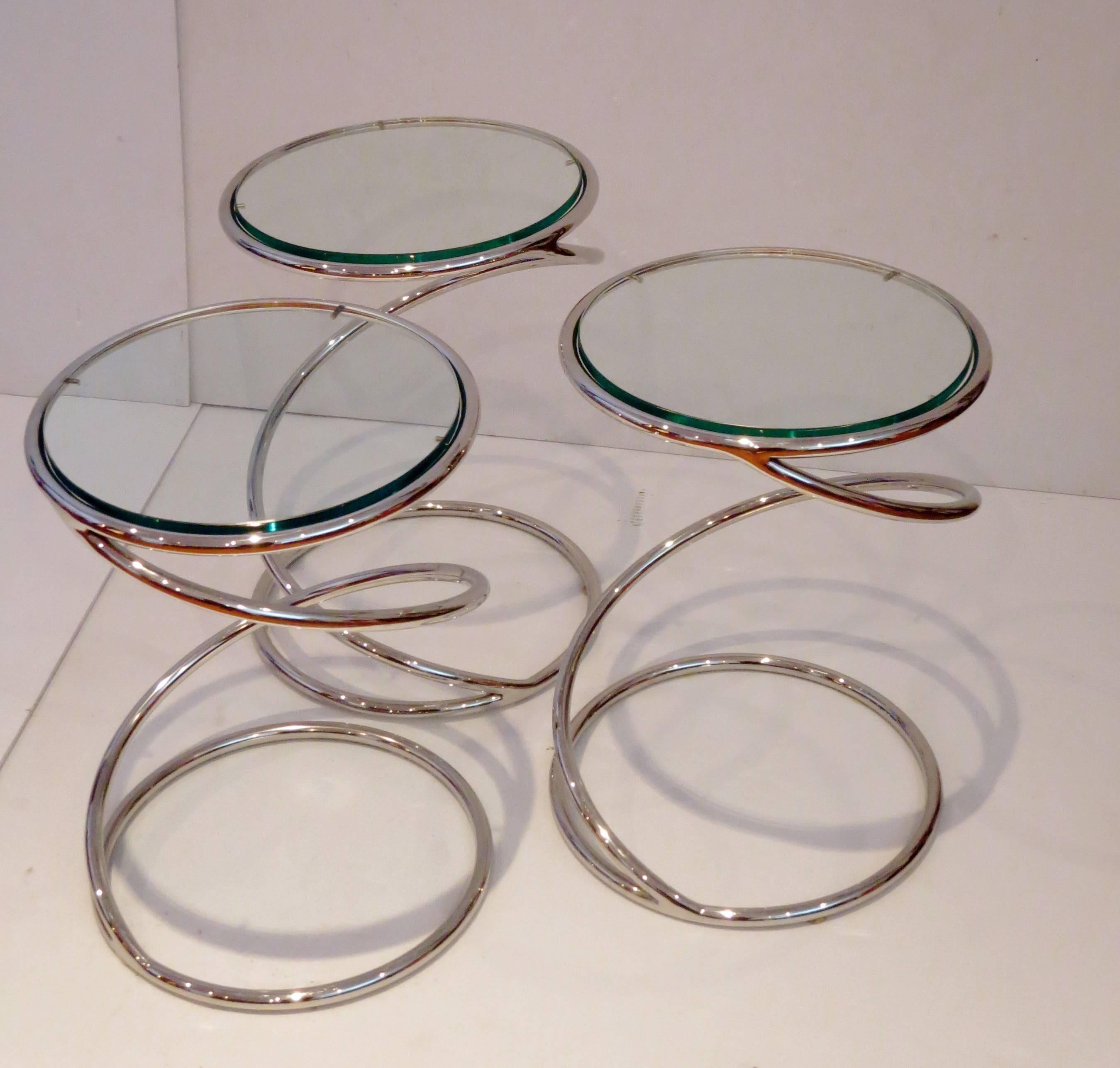 Simple elegant single cocktail tables designed by Leon Rosen for Pace furniture, in polished chrome and glass, great condition buyer has the choice to buy 1,2, or 3.