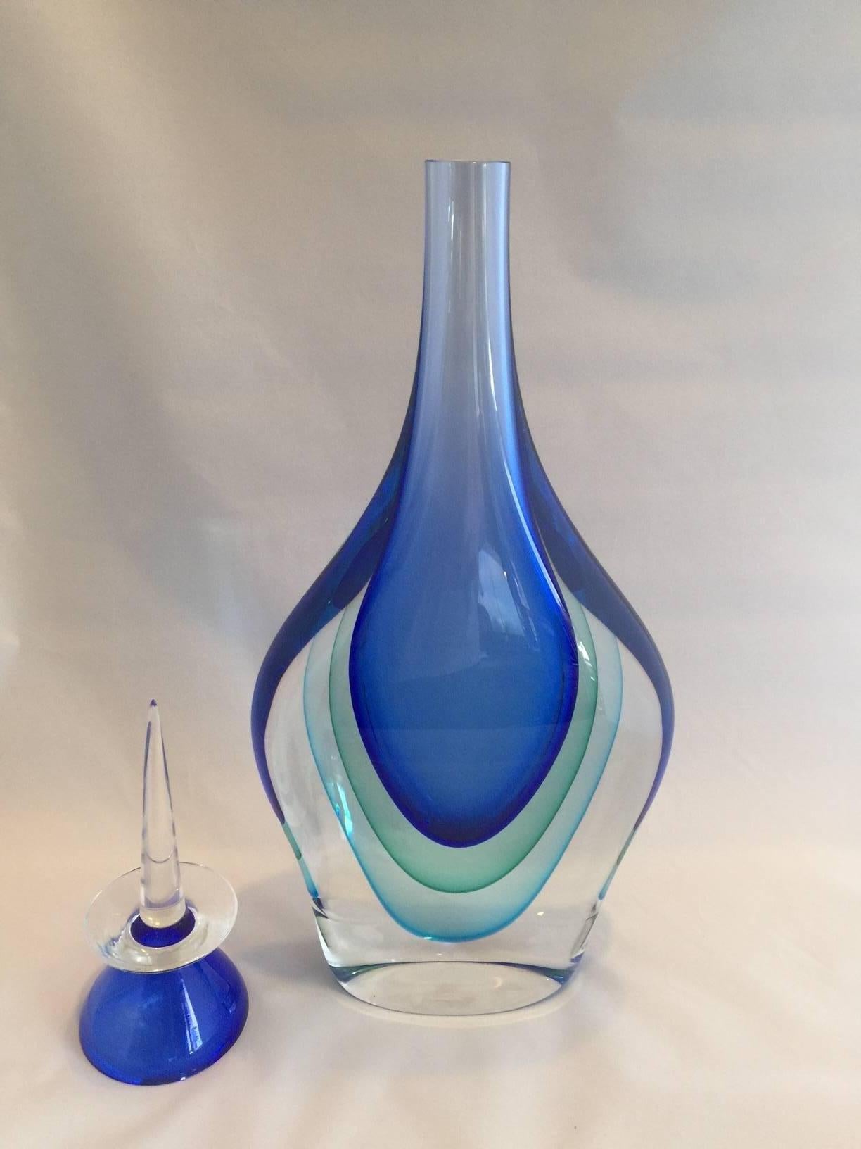 Gorgeous Murano handblown multi-Sommerso blue and green art glass decanter with topper. Created and signed by renowned Murano artist Luigi Onesto.