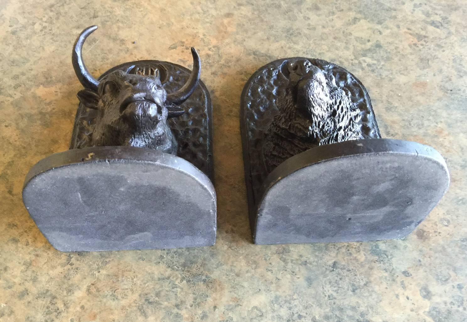 20th Century Fabulous Pair of Vintage Bull/Bear Bas Relief Iron Bookends