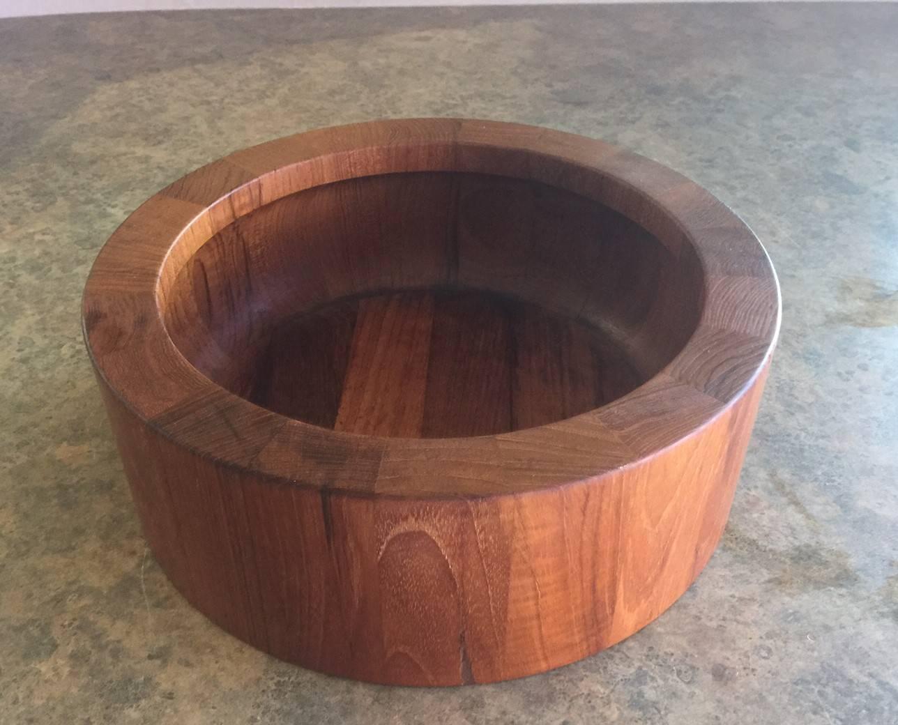 A very nice, symmetric, staved teak bowl by renowned Mid-Century designer Jens Harald Quistgaard. Made in Denmark.