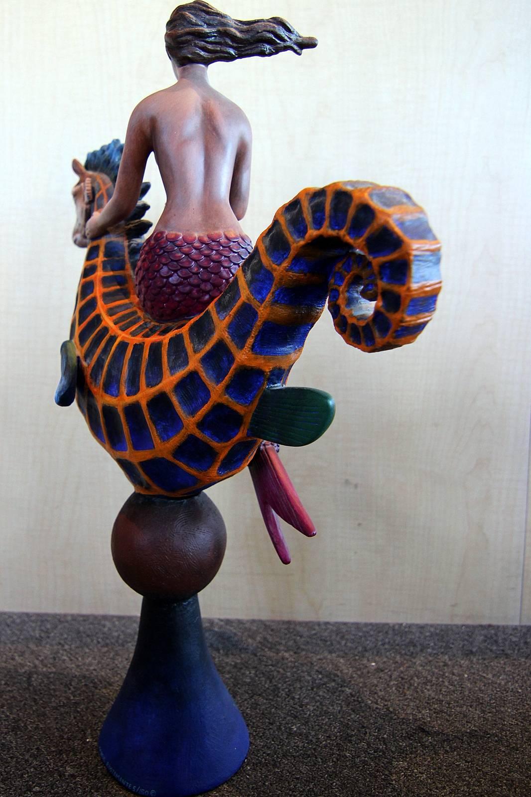 Resin sculpture of a mermaid riding a seahorse by Mexican artist Sergio Bustamante. The piece is hand signed and numbered 5/150 and was made in the mid-1980s. Great color and detail!