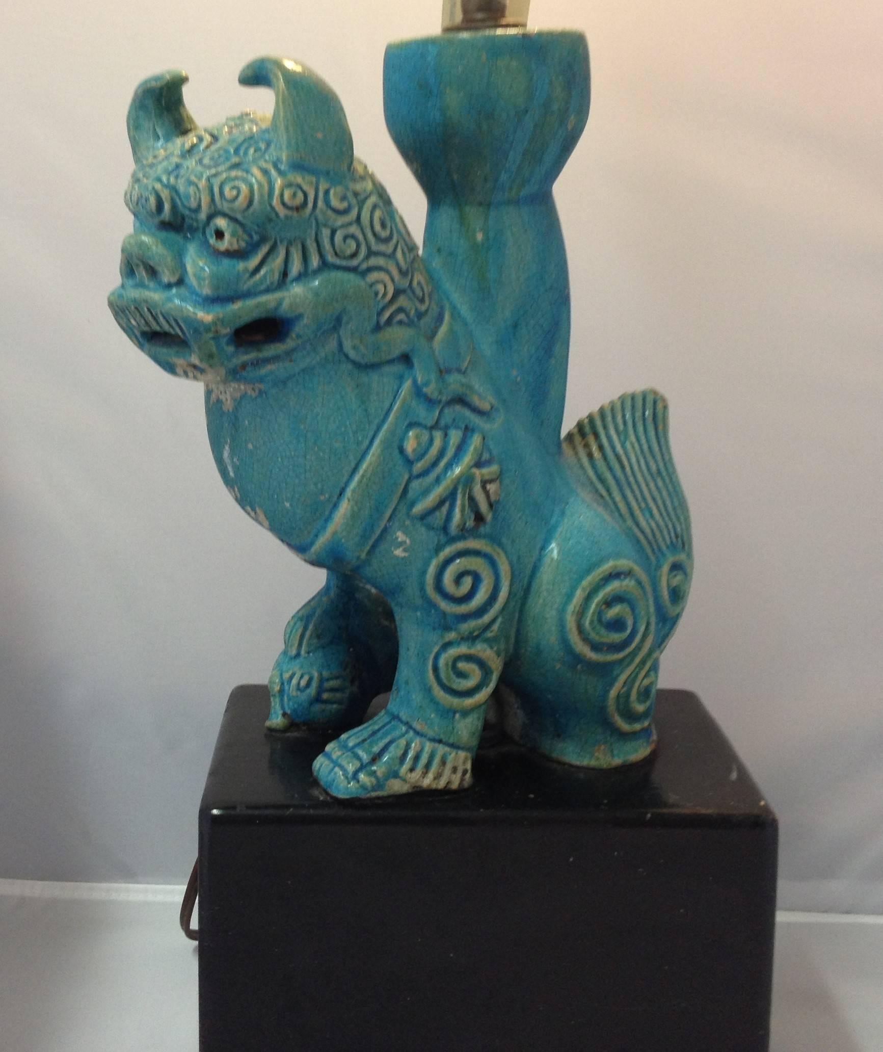 Vintage ceramic blue foo dog/lion table lamp. No shade, distressed look with great patina.
 