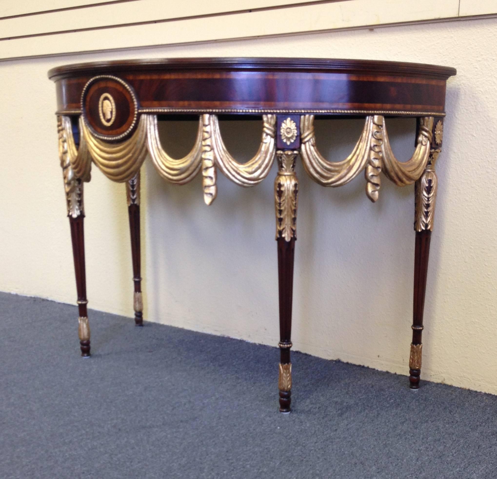 Fabulous demilune inlaid mahogany console table by Maitland-Smith. See our similar listing of a second M.S. demilune table. The two tables can be combined to form a round table.