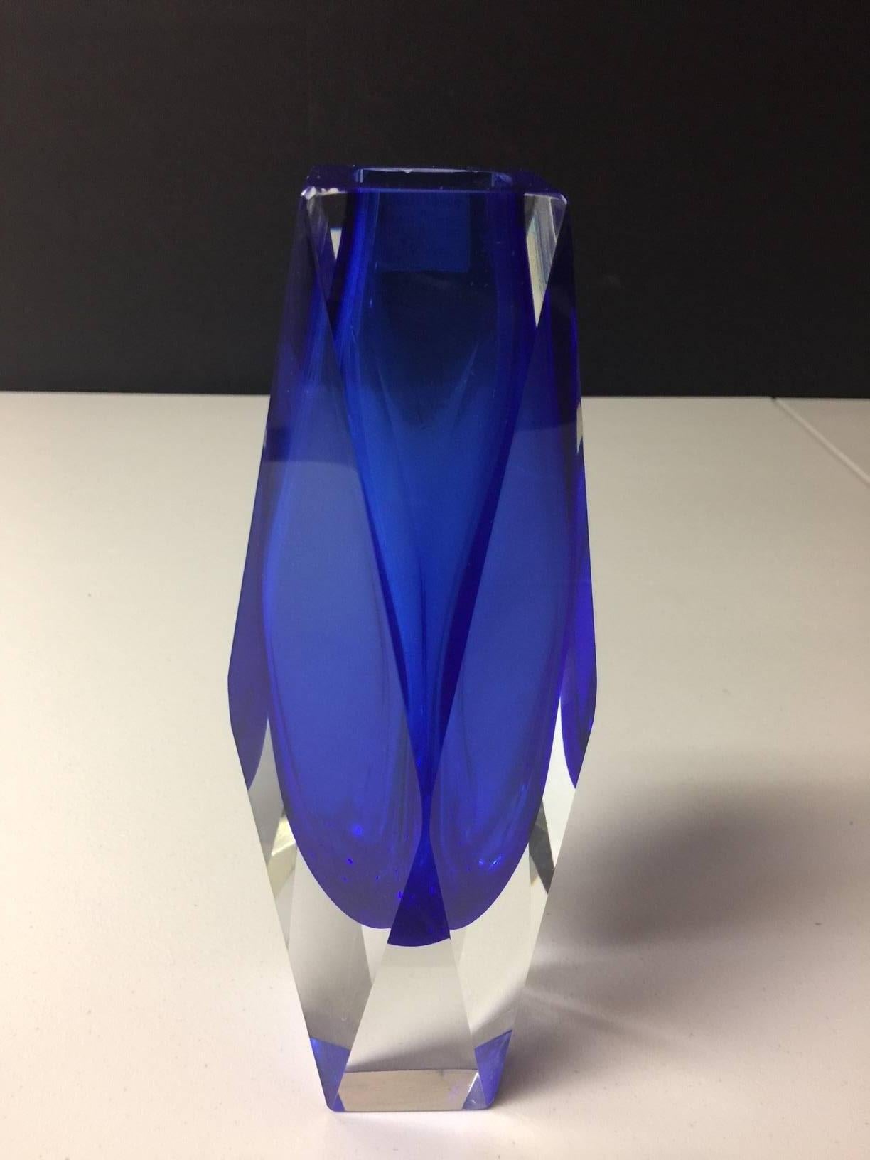 Cobalt blue Murano glass multifaceted vase with Sommerso technique by Alessandro Mandruzzato. Original, vintage, Mandruzzato tag attached.

Stunning color and clarity!