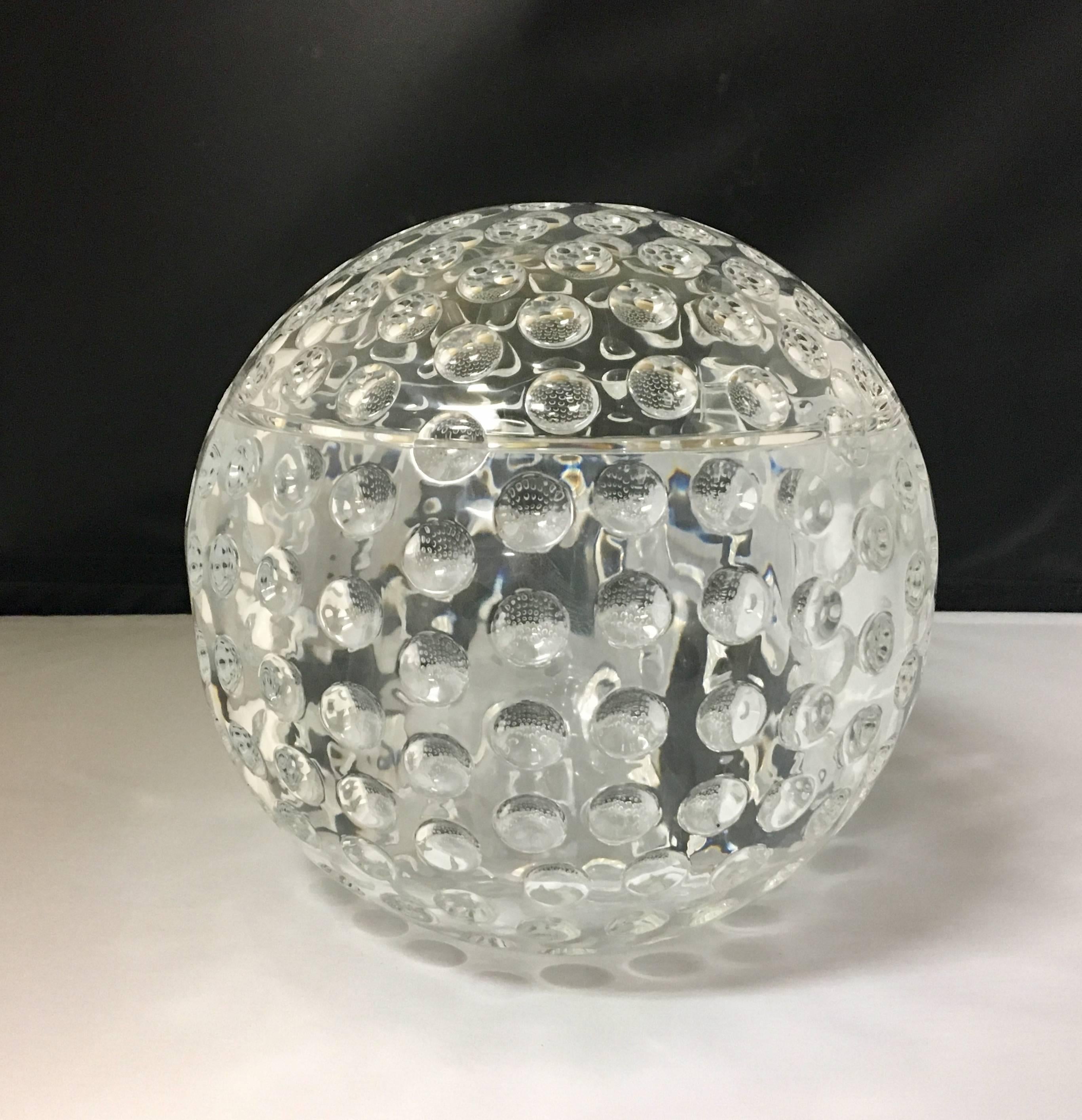 A very unique spherical ice bucket with bubble pattern, circa 1980s. Swivel top open or close mechanism. Excellent condition with no chips, cracks or scratches. Very nice functional design.