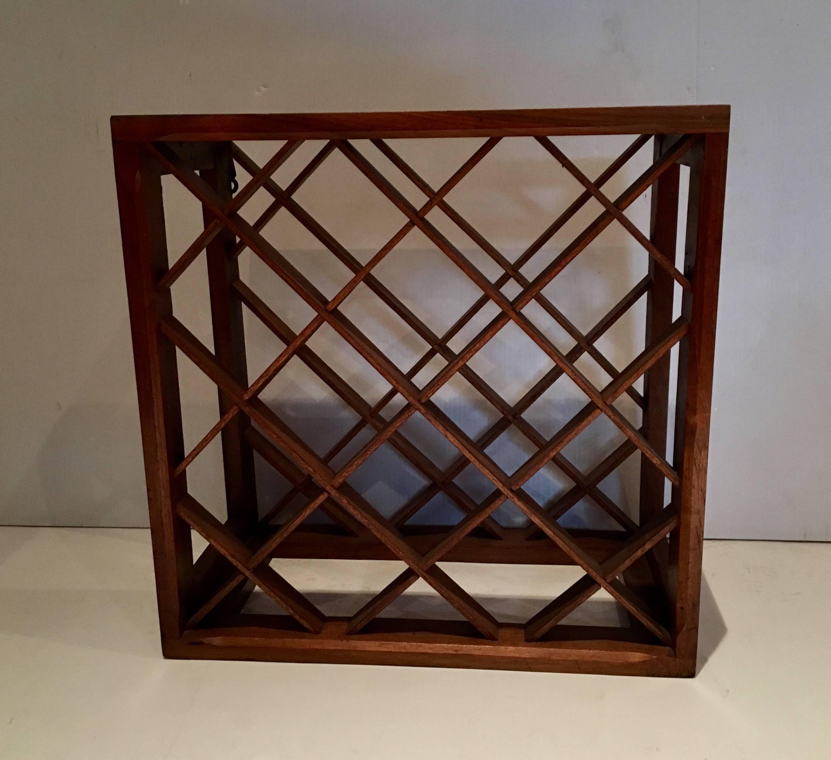 Simple elegant American walnut wine rack, can be hang on the wall or use on top of a table, 12 bottle capacity freshly refinished Versatile, circa 1960s.