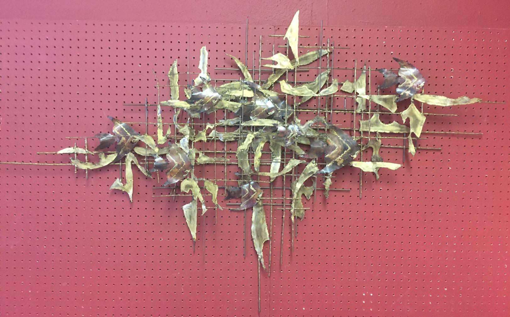 Unique Brutalist style brass wall sculpture of 