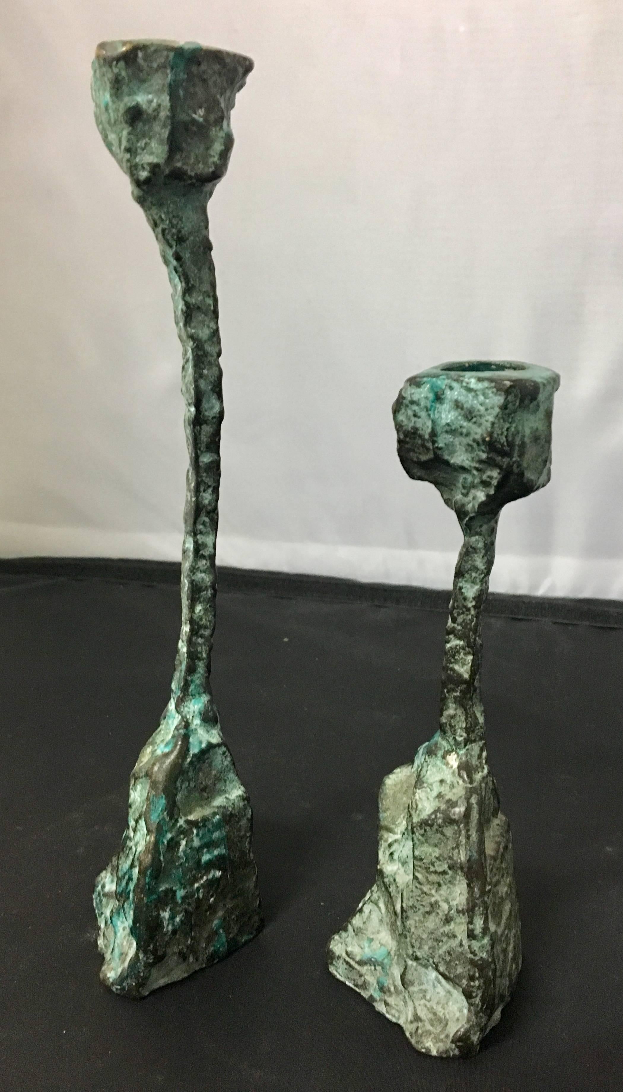 Rare set of Brutalist style candleholders in nice patinated bronze finish. Very unique look in the style of Paul Evans. The tall one is 9.5" high and the shorter one its 6.75" high.