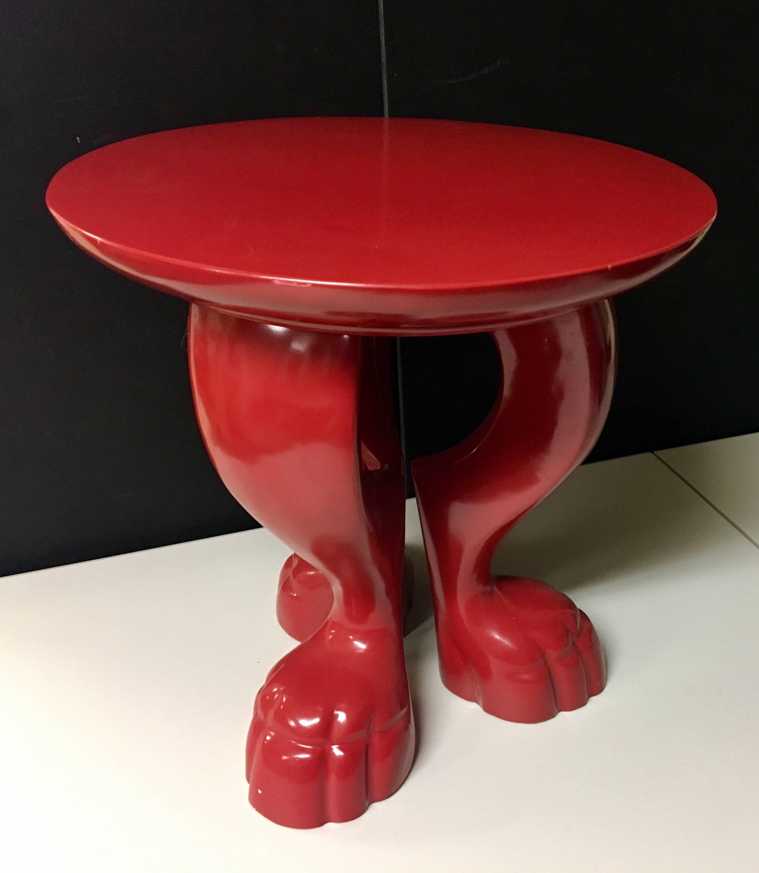 Eclectic tri-footed pedestal table designed by Jacques Garcia for Baker. The table is very heavy and is finished in red lacquer. It would make a great conversation piece in any room!