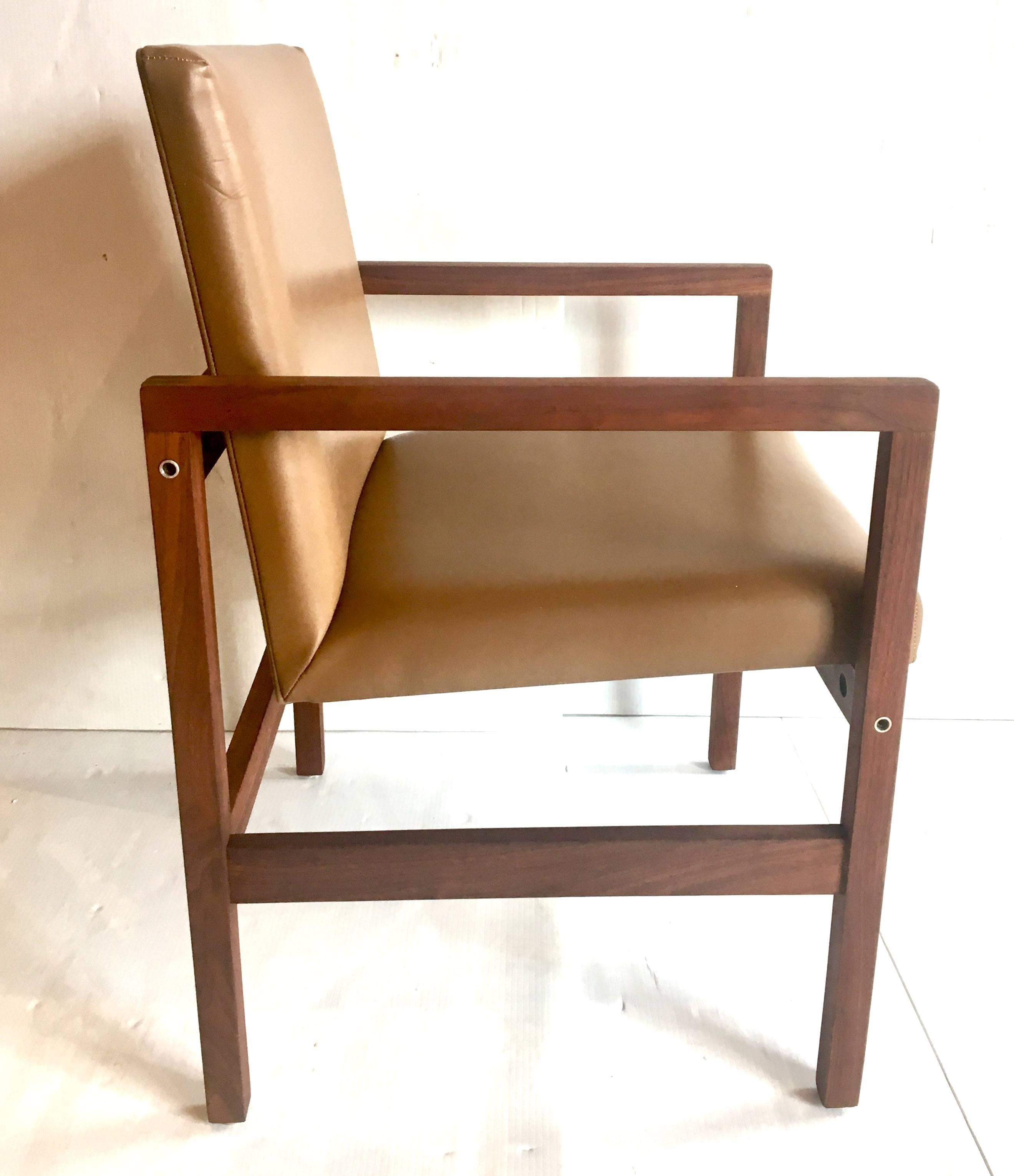 Amazing pair of solid walnut frames, with Naugahyde fabric armchairs, circa 1950s, great craftsmanship the chairs have been restored and cleaned solid and sturdy very clean and nice condition, nice dovetail detail on each angle with polished