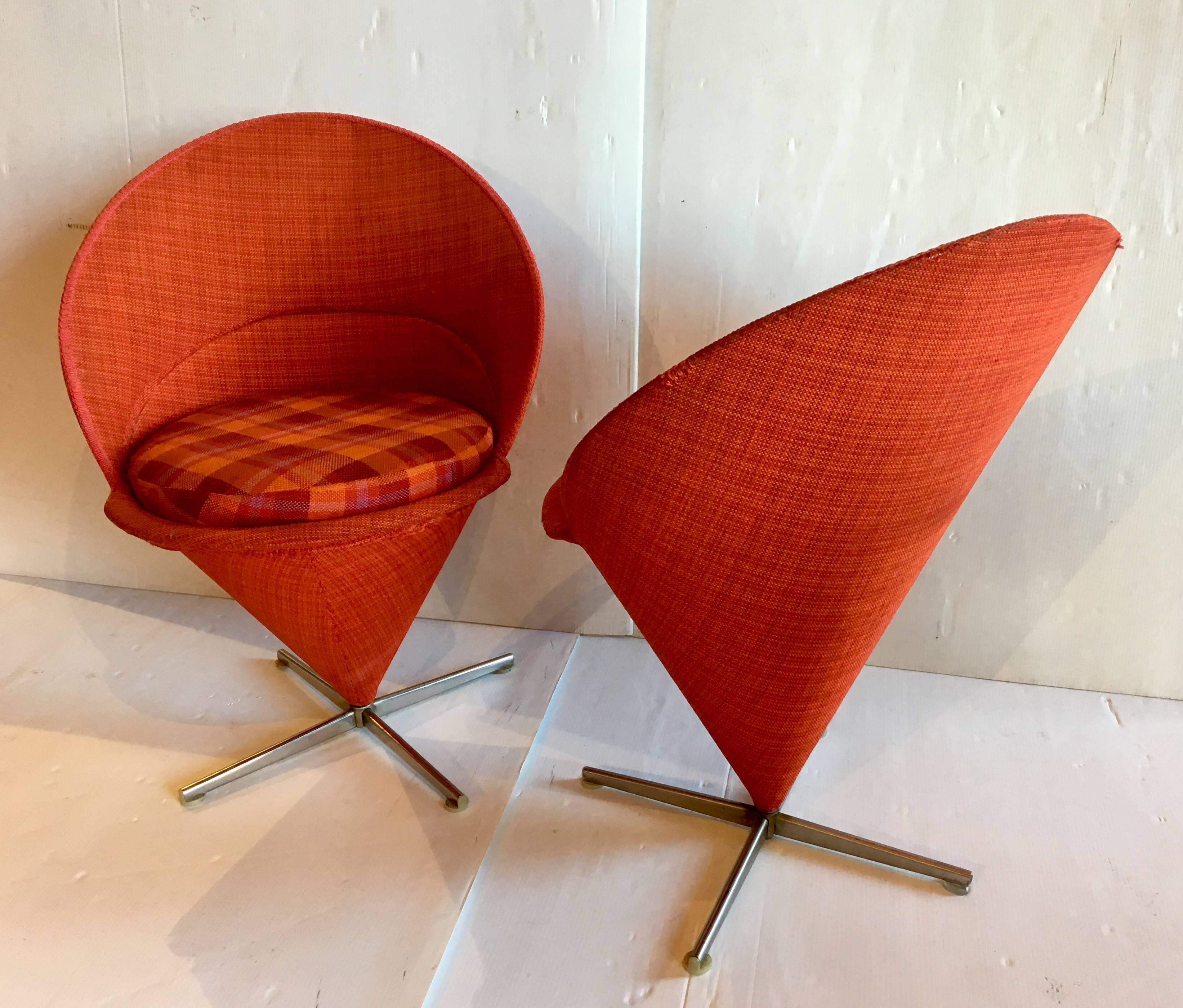 Beautiful pair of red/orange cone chairs by Verner Panton, early production original condition and fabric, polished steel base. designed in 1958 with early Made in Denmark label, the chairs shows some worn and a couple of light stains and some small