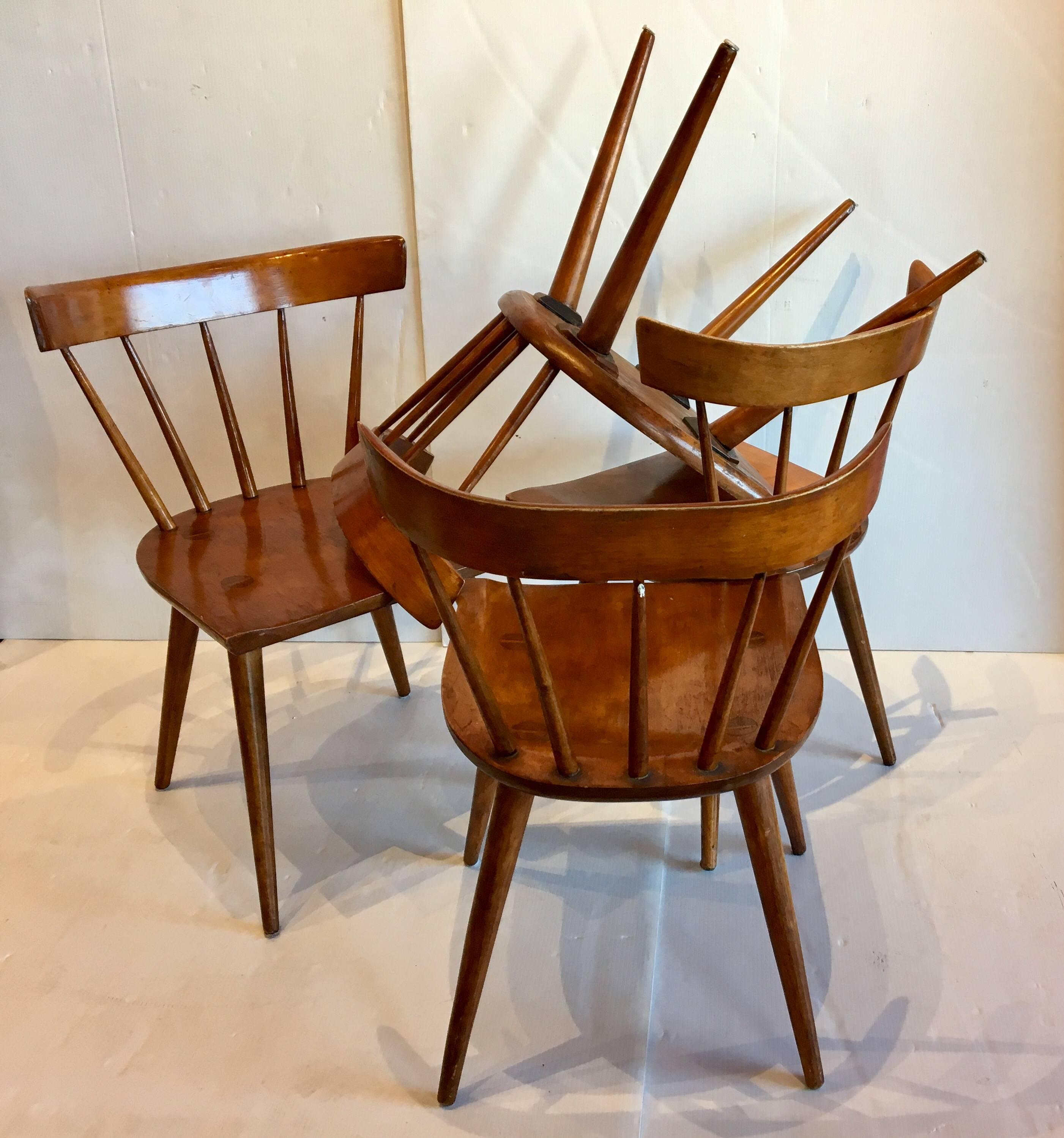 Nice set of four solid maple chairs by Paul McCobb in its original finish solid and sturdy, the chairs have patination some chips on the finish and light dings on the wood, they look great on this rustic finish.