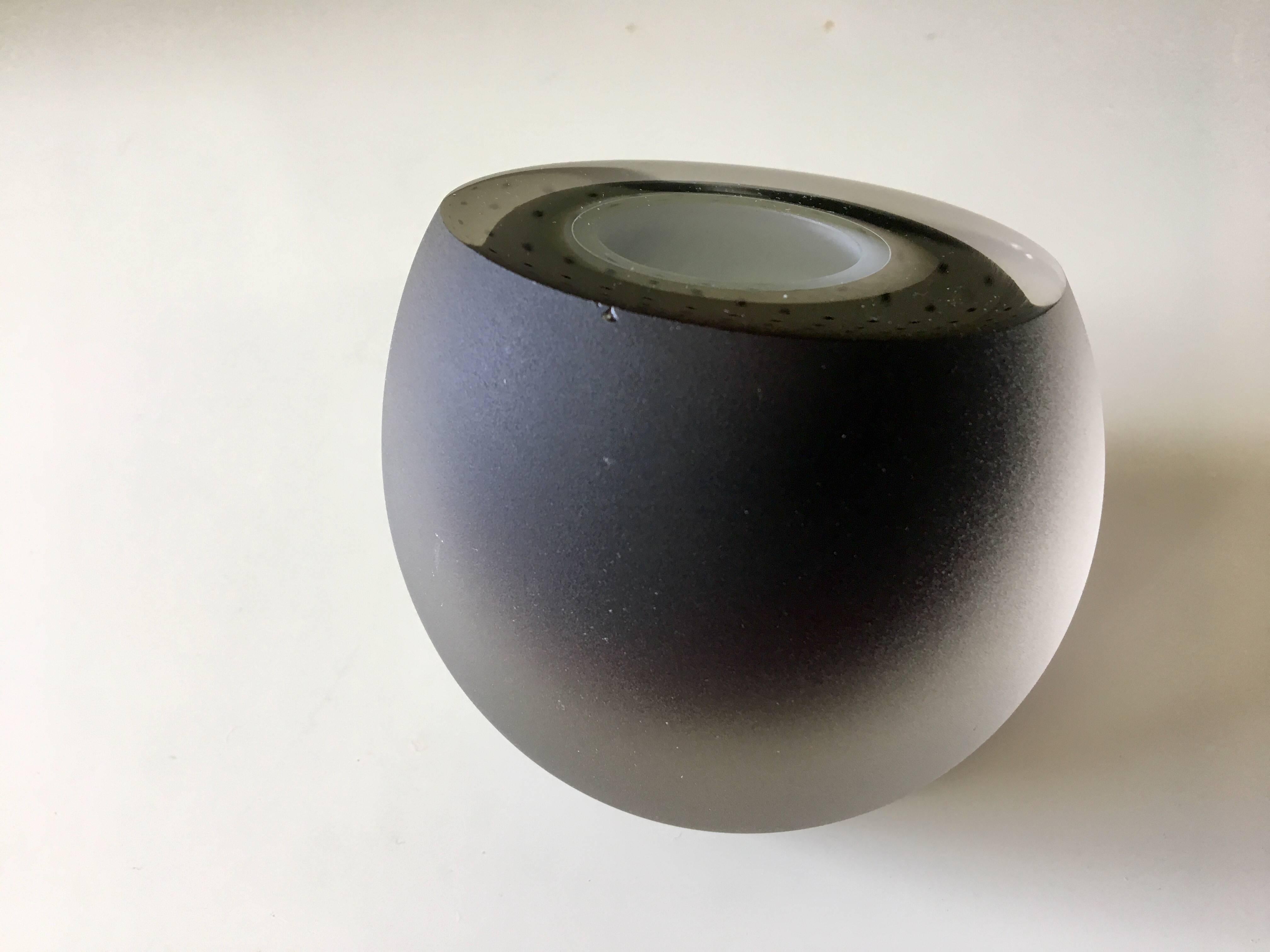 Beautiful and rare blown glass piece entitled "Night-Time" by New Zealand artist Murray Hill. Signed and cataloged, the gorgeous sculpture has an acid etched finish with purple and white insert; truly a beautiful piece.
