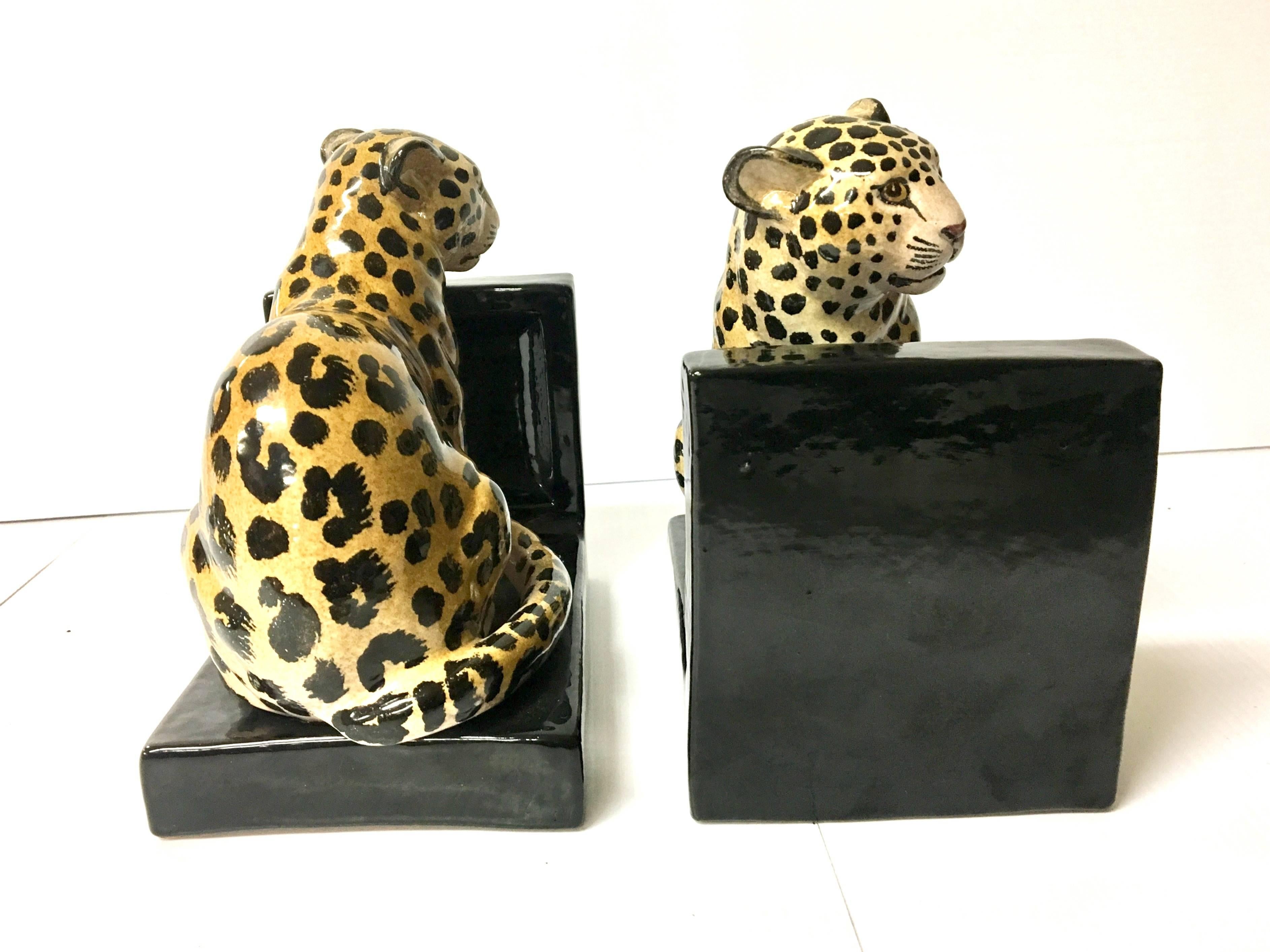 Beautiful pair of ceramic leopards bookends made in Italy, circa 1970s. Elegant and unique!