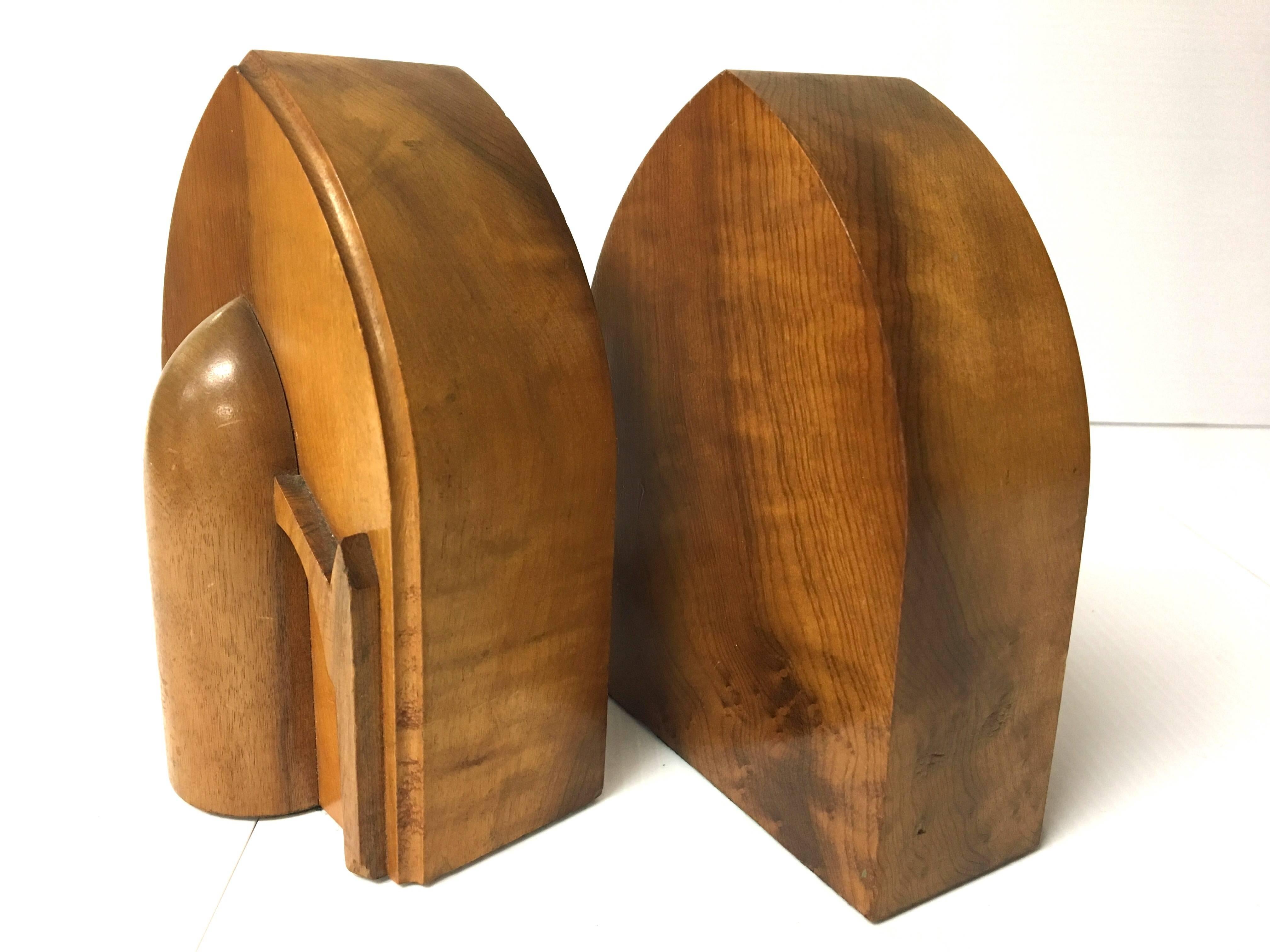 Nice pair of Art Deco bookends in solid maple with a cool atomic design.  #233