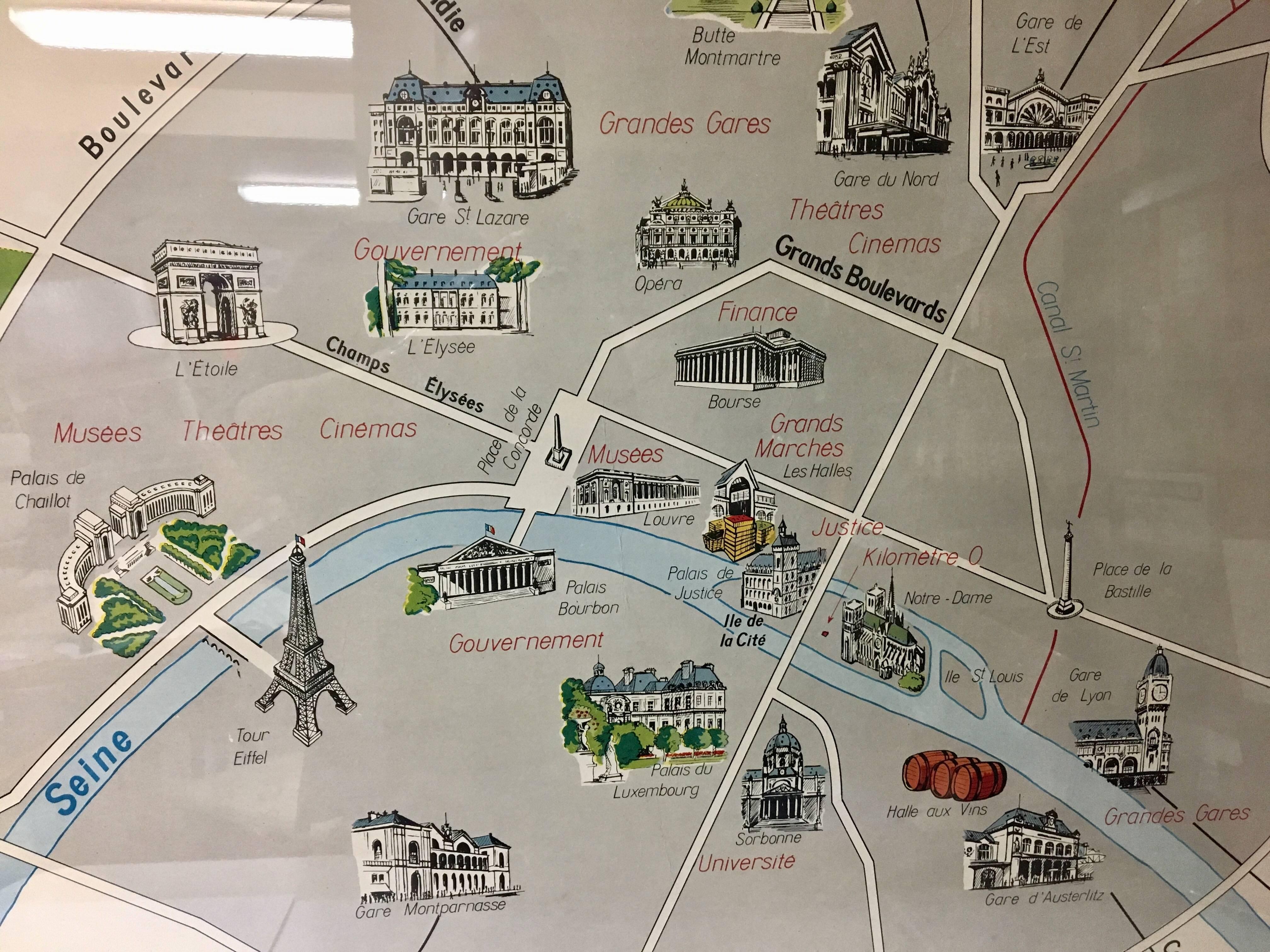 Stylishly framed, Paris metro map print, circa 1950s by Imprimierie Georges Lang in very nice vintage condition. The piece measures 38.75" x 34" and shows central Paris metro area and all the historical sights. A very cool map that would