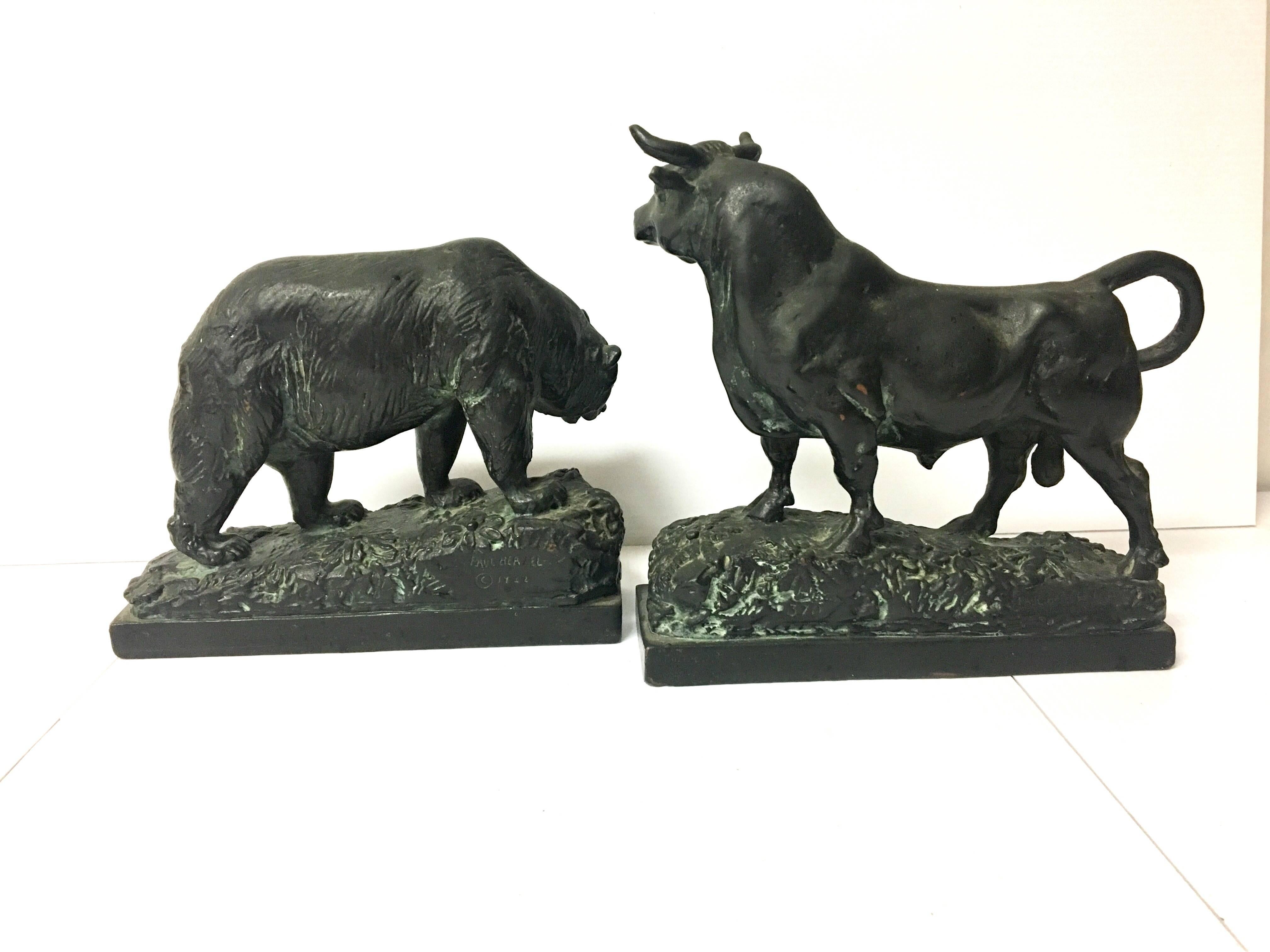 Beautiful, vintage pair of bull and bear bronze bookends by Paul Herzel, circa 1940s. Wonderful patina and detail.