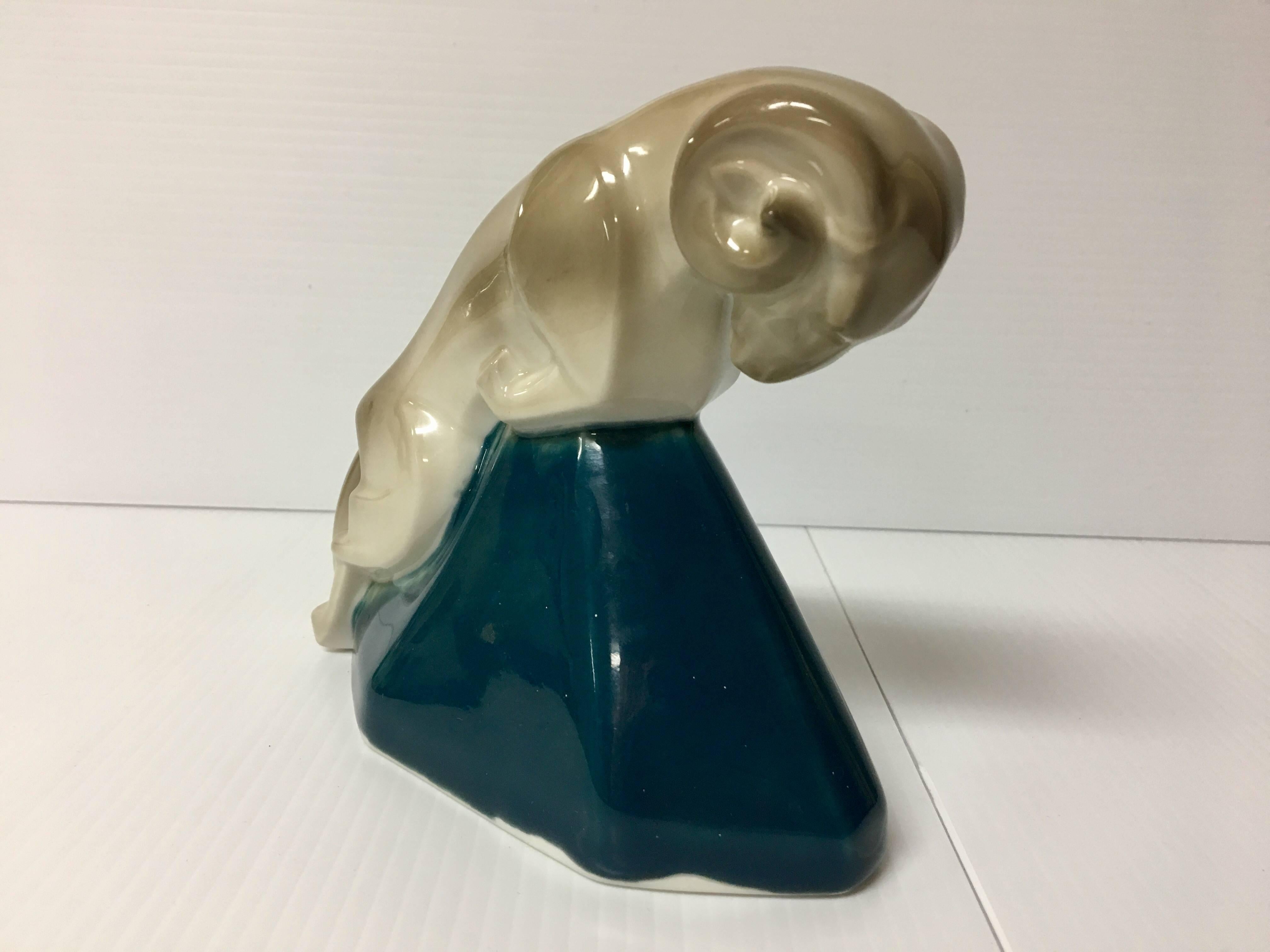 Beautiful, small porcelain ram sculpture made in France by Limoges. The piece is signed by Camille Tharaud and is in excellent condition.  #251