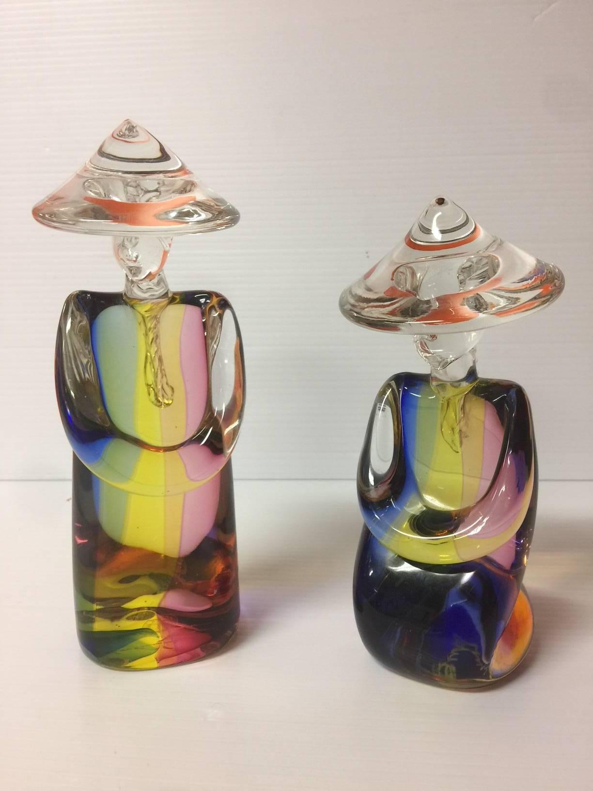 Gorgeous pair of Sommerso art glass Chinese figures in multi-colors by famed glass artist, Archimede Seguso for Murano glass. Each piece is signed by the artist; incredibly vibrant color and great texture!