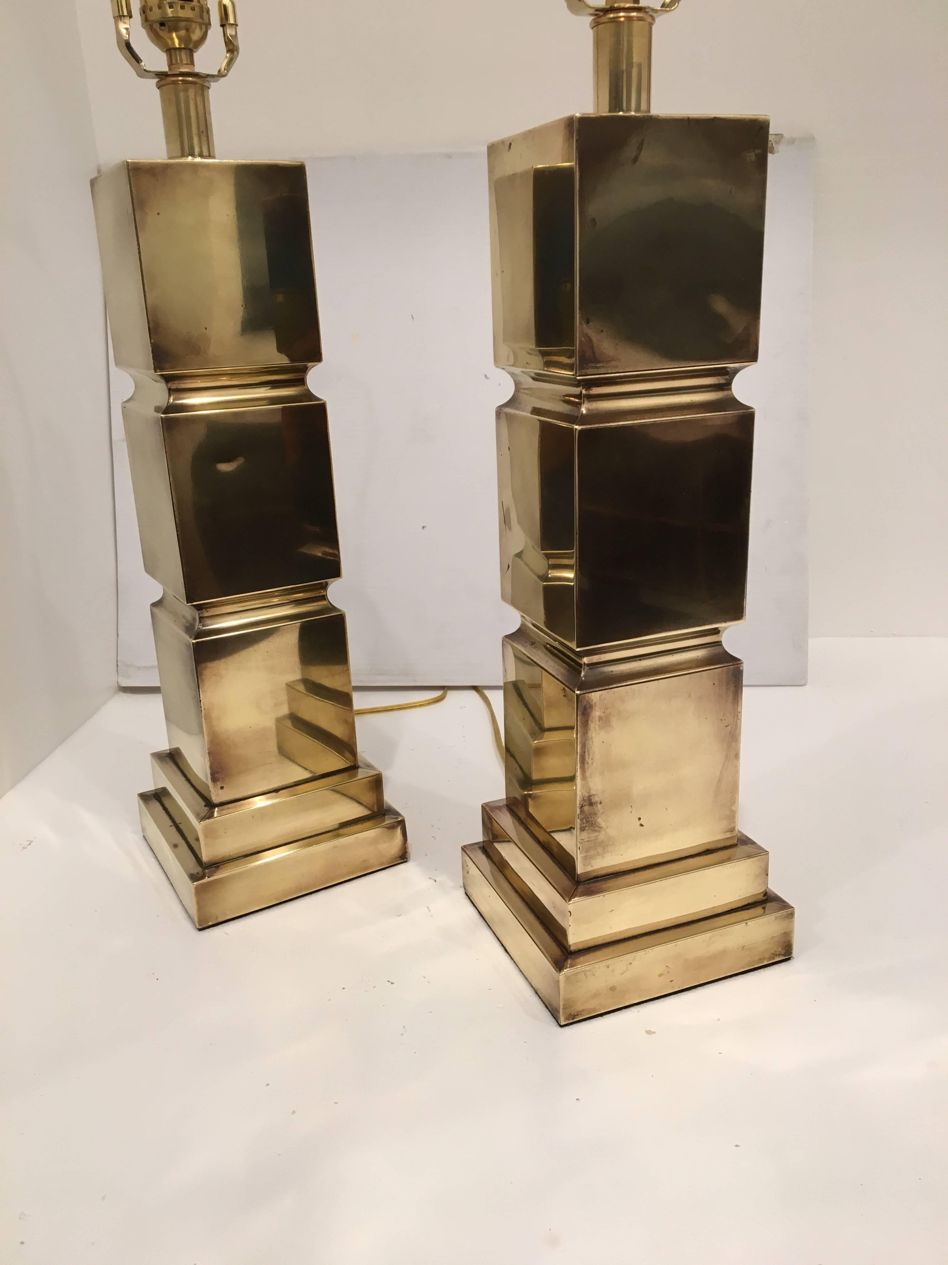 Beautiful pair of geometric table lamps in the style of Paul Evans. In a semi polished brass finish, these pair of lamps have been professionally rewired, and light polished, new cords and sockets with harps. The lampshades are not included each