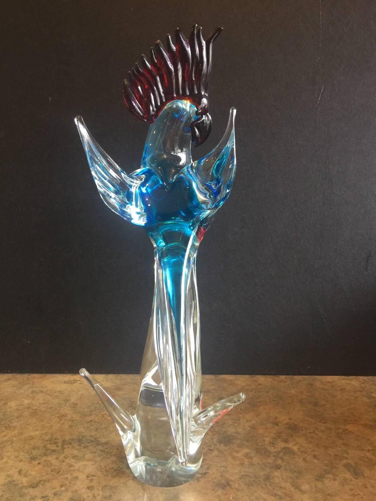 A very stylish 15" high Italian Art Glass cockatoo or bird sculpture by Murano Glass, circa 1960s. Great color and clarity in this vintage piece which includes original Murano foil label.