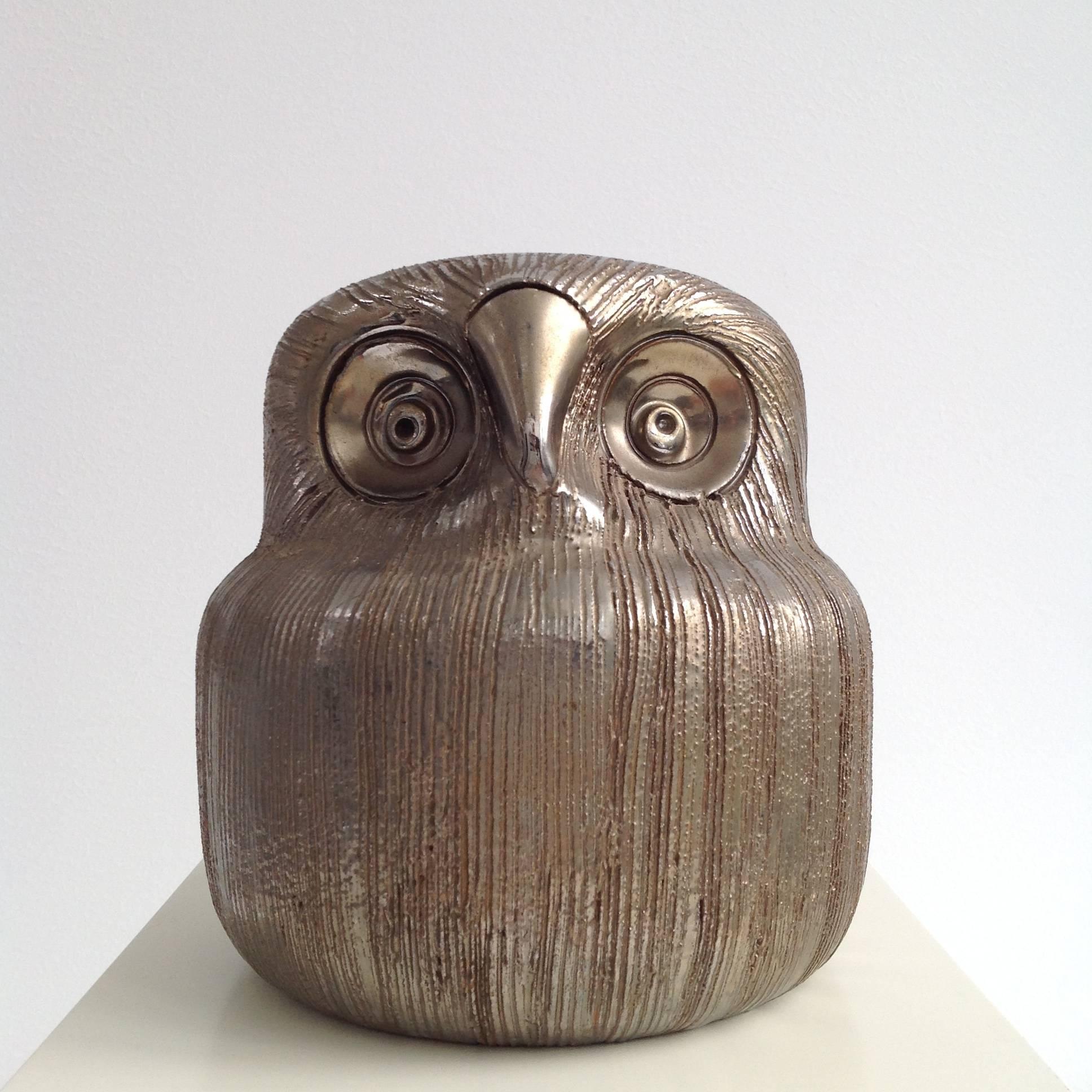 A beautifully executed Italian modernist polychrome glazed ceramic sculpture of a standing owl this a true gem with great poise and character. No signature.

More pictures and with a higher resolution are available on request. With over 25 year's