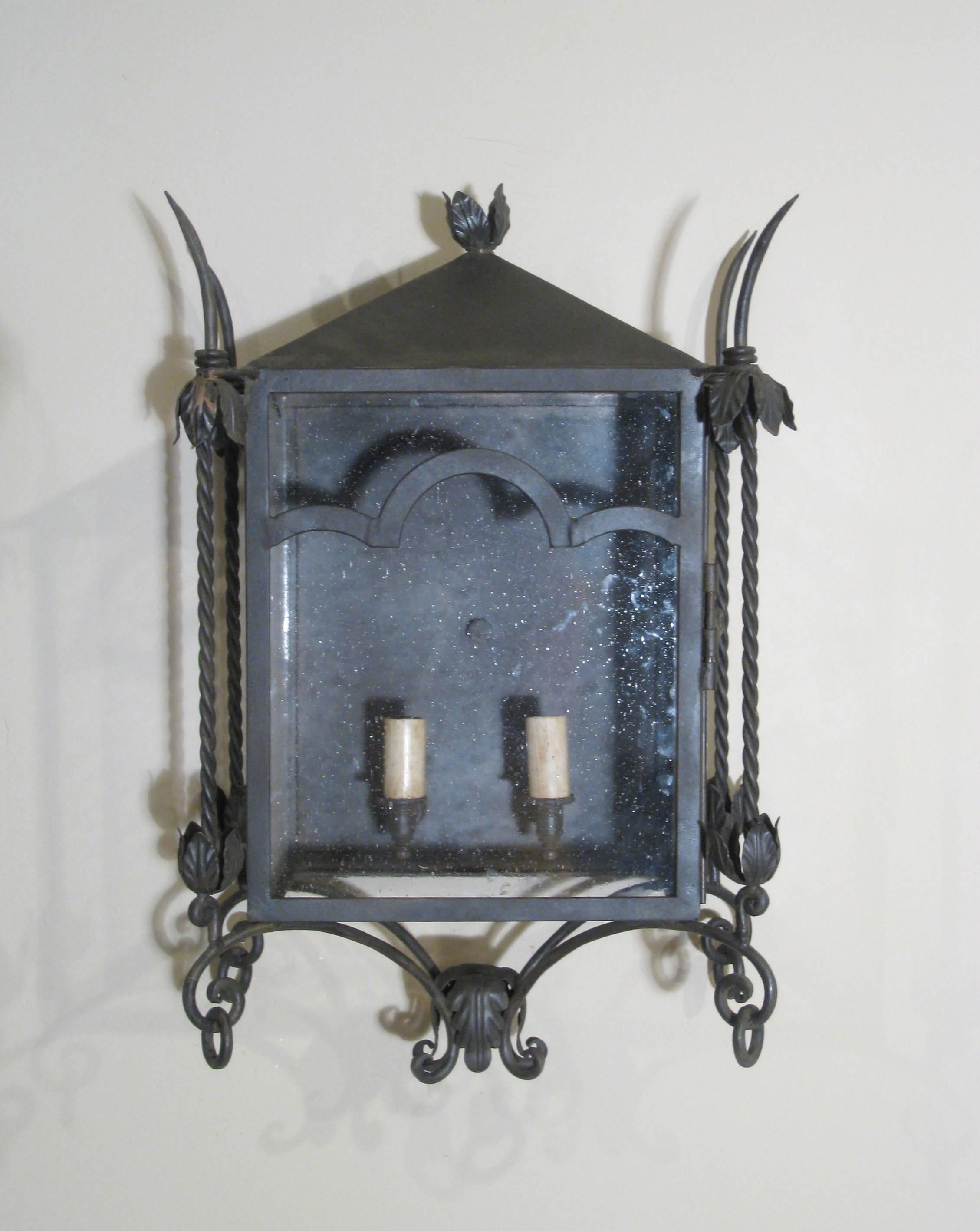 Part of the CHANDELIER Product Line, this is our Italian Wall Mount, Small. This fixture is made for Exterior use and is UL Listed. Two candelabra base bulbs up to 60 watts/socket. Also available in Large Size. This style wall sconce also matches