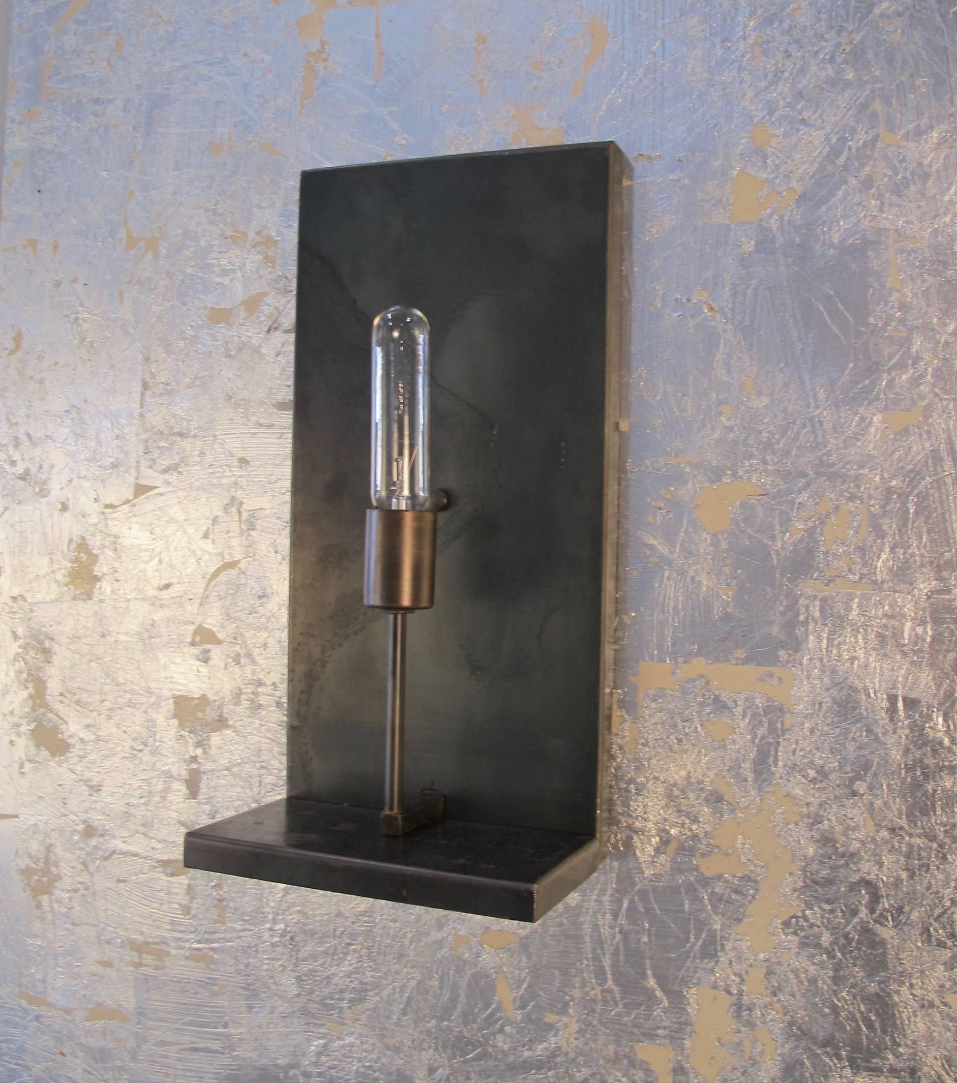 Custom Industrial metal wall sconce with acid finish. Single medium base bulb. Four in stock. Courtesy to the trade.