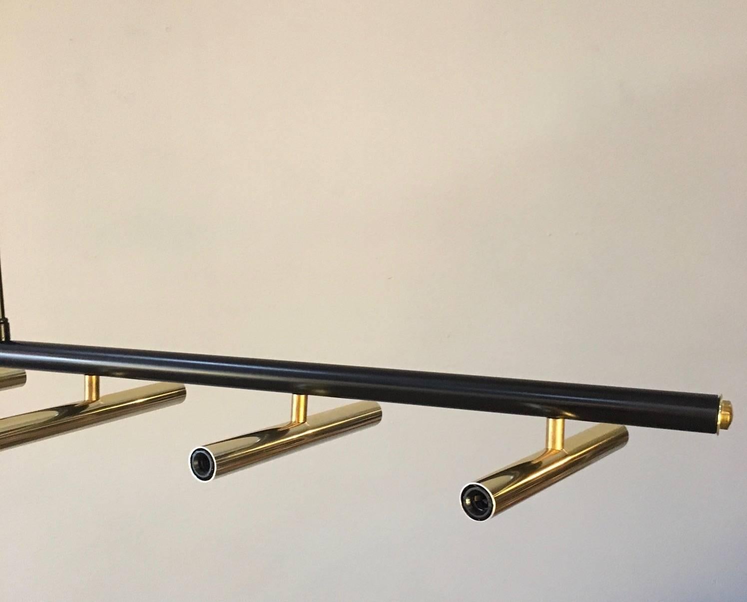 black and brass linear chandelier