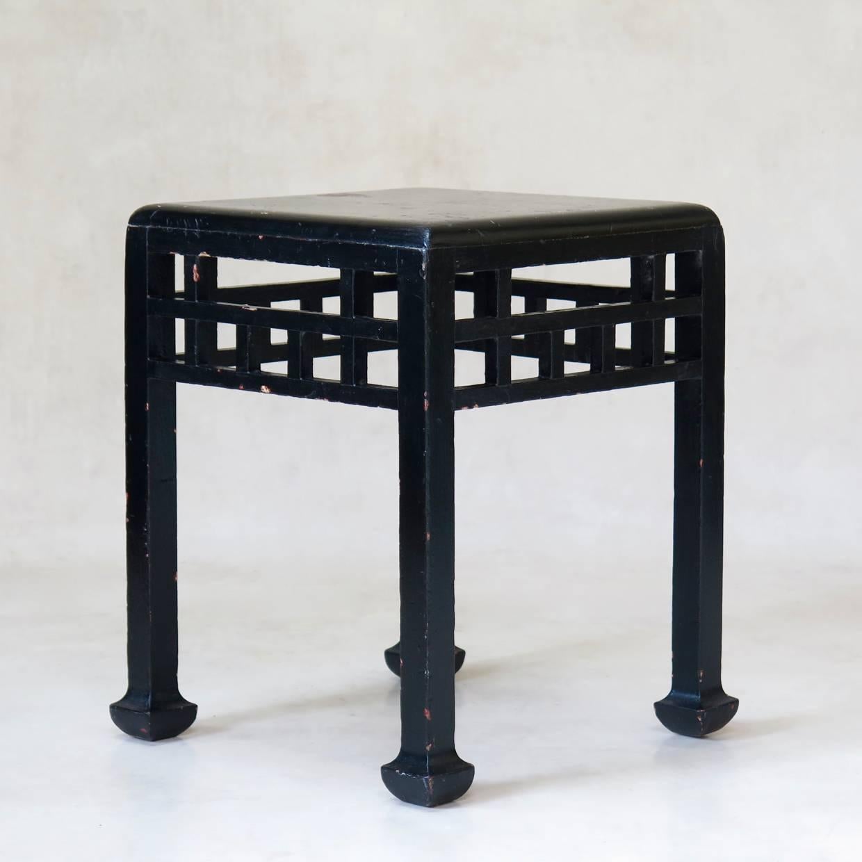 Very nice stool in the Chinese taste, with a latticed apron and ending in pretty feet. Painted black (red paint is visible beneath in small areas).

Attributed to Atelier Martine (Paul Poiret).