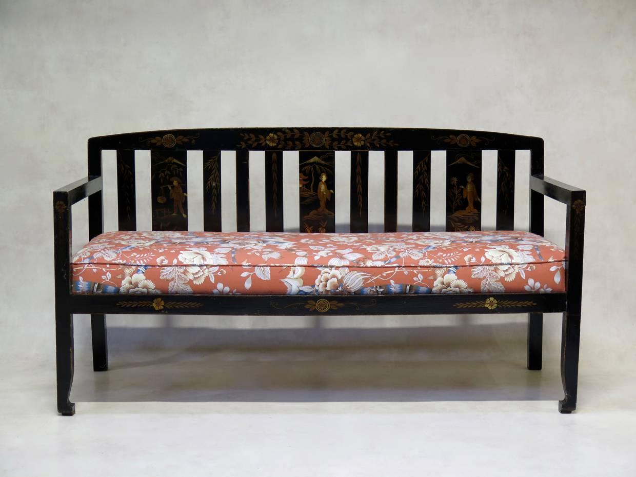 Chinese Art Deco style living-room set, comprised of a two-seat sofa and a pair of armchairs. The set is painted black and decorated with hand-painted Chinses-style figurative scenes and floral embellishments. Newly upholstered seats.

Dimensions