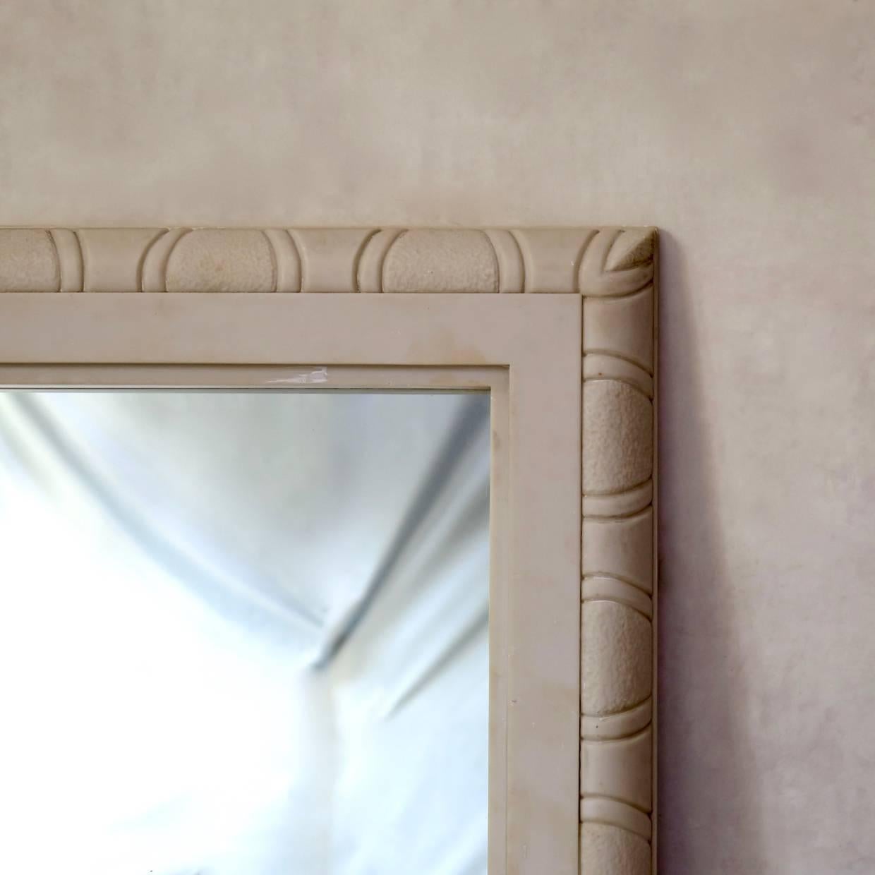 Elegant pair of Art Deco mirrors with white marble frames. One rectangular and one square.

Dimensions provided below are for the rectangular mirror. The square one measures (in centimeters): 90 x 90.

     