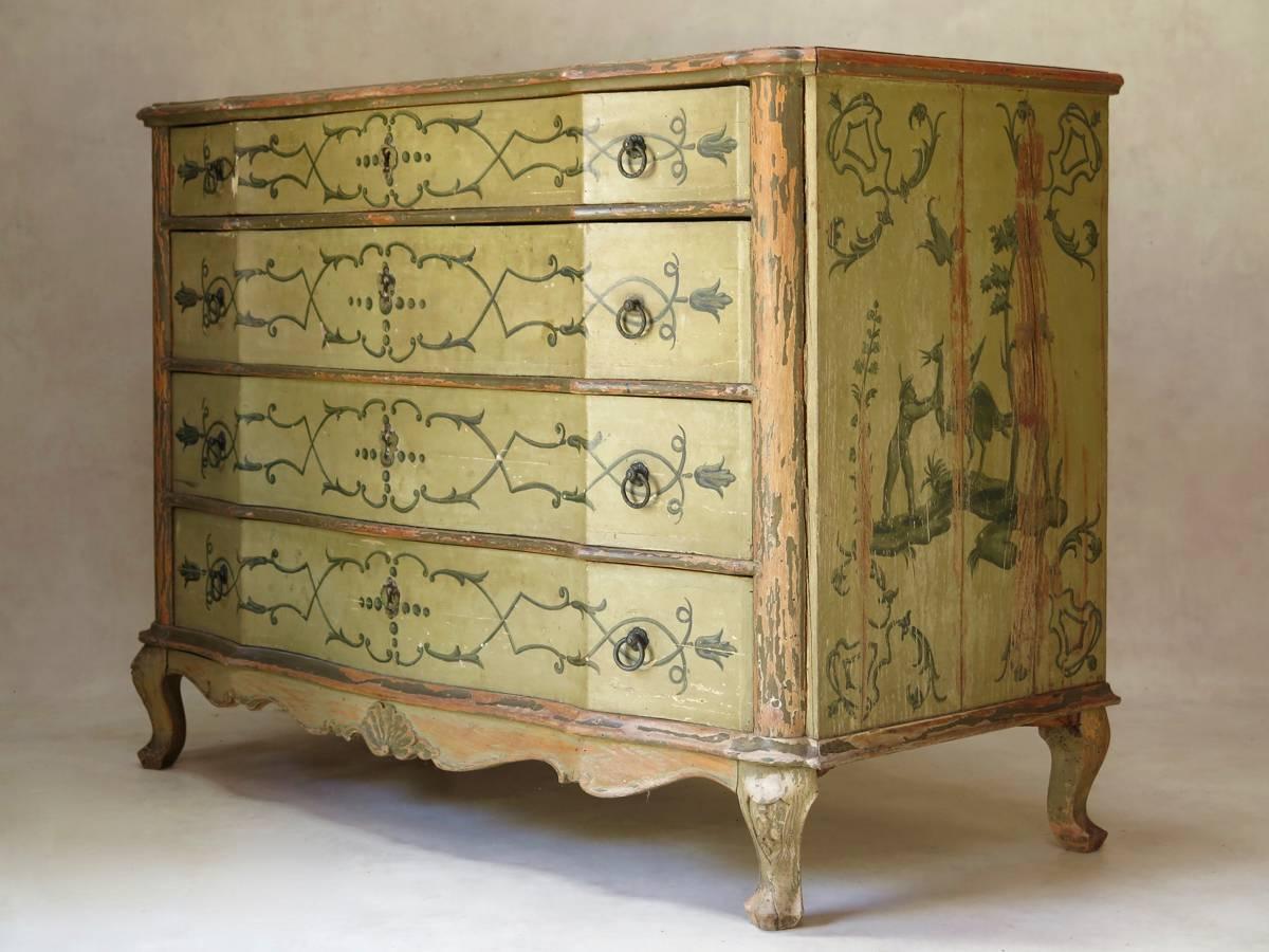 Gorgeous and decorative chest of drawers in the Baroque (decor) & Louis XV (shape) styles, painted with lovely motifs on the front and chinoiserie-inspired scenes on both sides. The painted decor on the top is largely worn off. Lovely green and grey