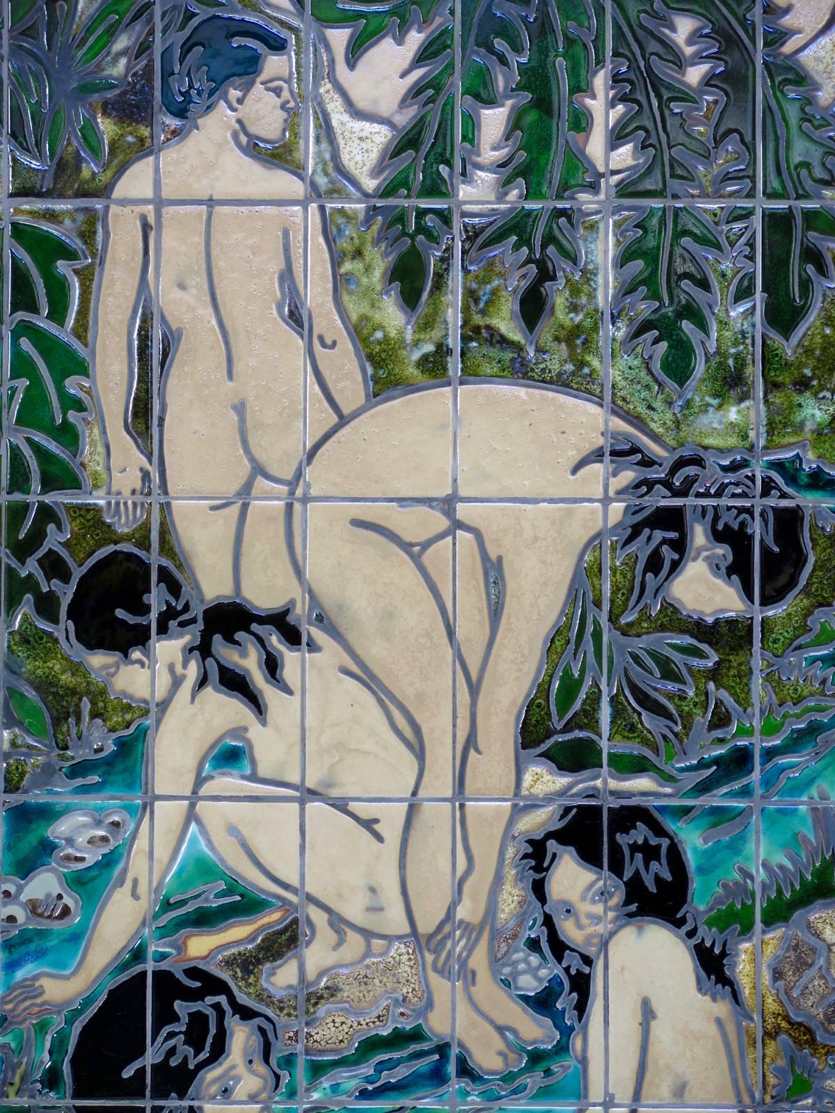 Large decorative ceramic panel on wood, depicting five women by a stream, in an idyllic, tropical setting. Very lovely depth of color. 
The ceramicist is Claude Vayssier (signature on the bottom right-hand side), who worked in pottery ateliers in