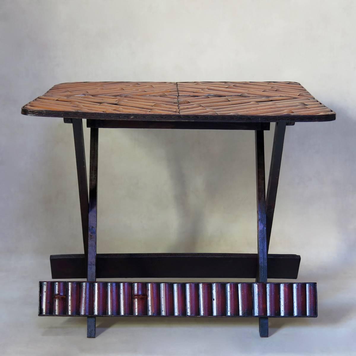 Chic, vintage folding table with a patterned top, and chevron-decorated surround.