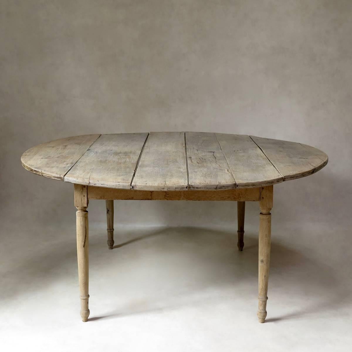 large round oak dining table