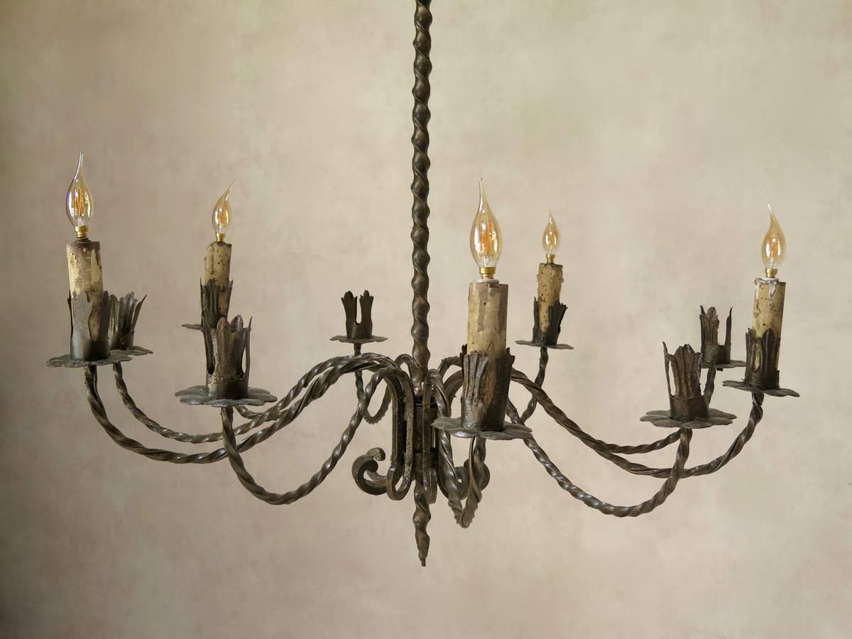 Painted Large Burnished Gold Iron Chandelier, France, circa 1920s For Sale
