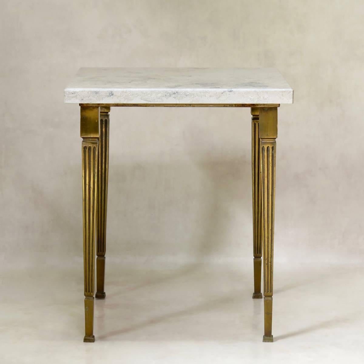 Very lovely quality pair of solid brass side tables, with fluted and tapering legs. Light stone tops.