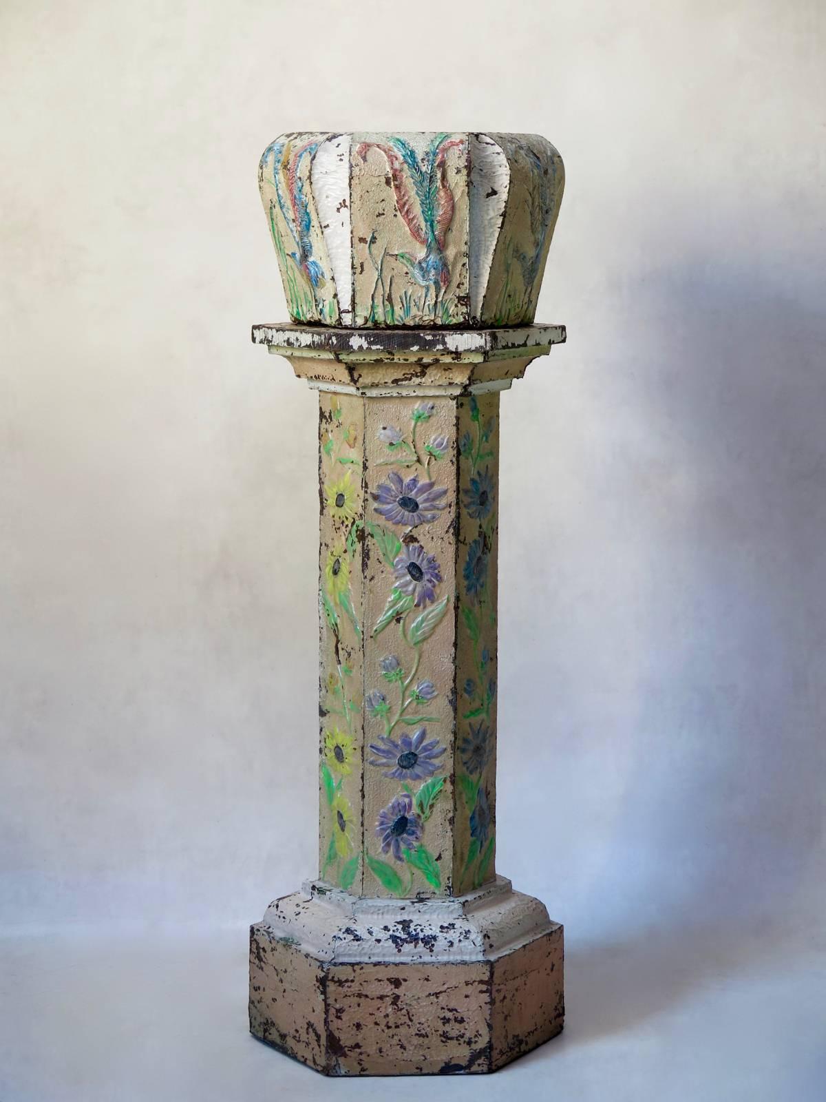 Very unusual and pretty plant stand (pedestal and cache-pot). The wood structure is sheathed in fine sheet copper, which has been decorated with a motif of repoussé birds and flowers, and otherwise has a hammered effect. The copper was then painted