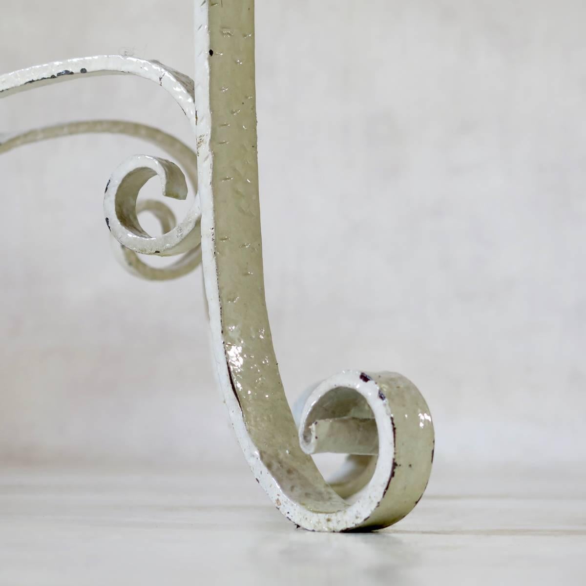 Glass Pair of Elegant Iron Console Tables with Acanthus Leaf Motif, France circa 1940s For Sale