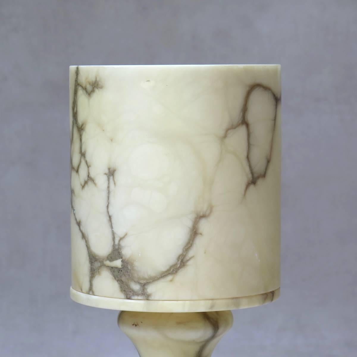 Large alabaster lamp, giving off a lovely warm light when lit.