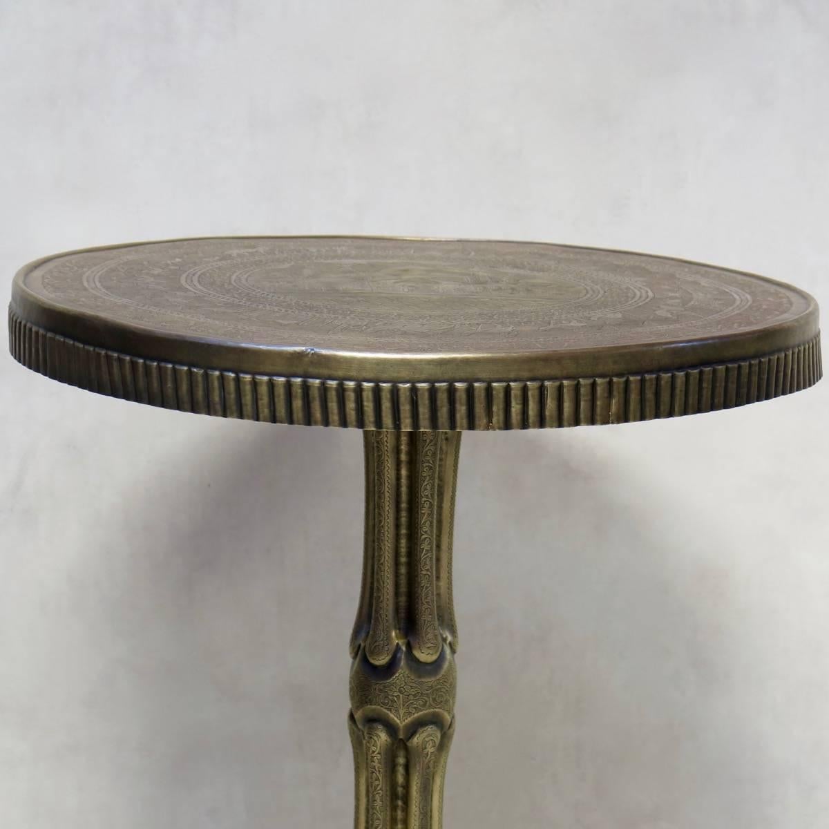 Finely-wrought copper gueridon from Tripoli, with an elegant stem base, and a decorated top. Stamped on the rim of the base.