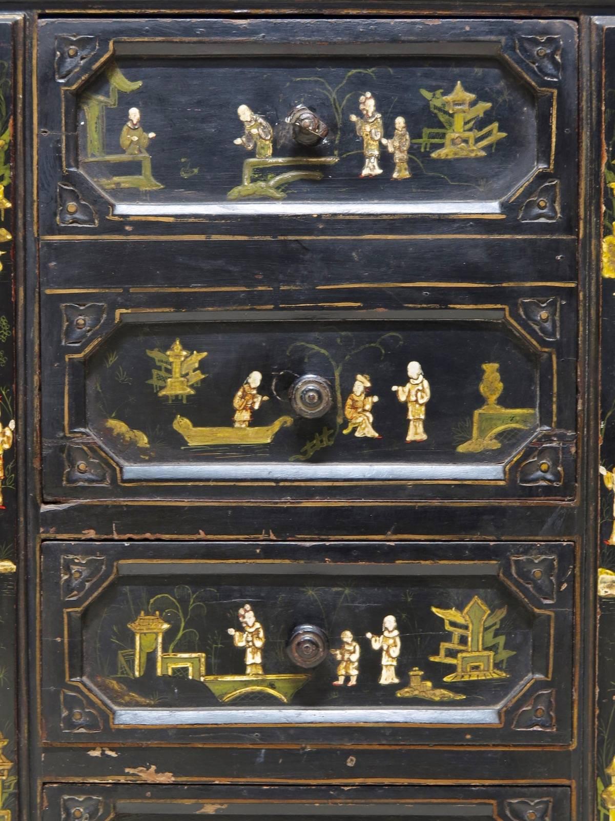 Charming Napoleon III cabinet, lacquered black with Chinoiserie decor, and a red marble top.