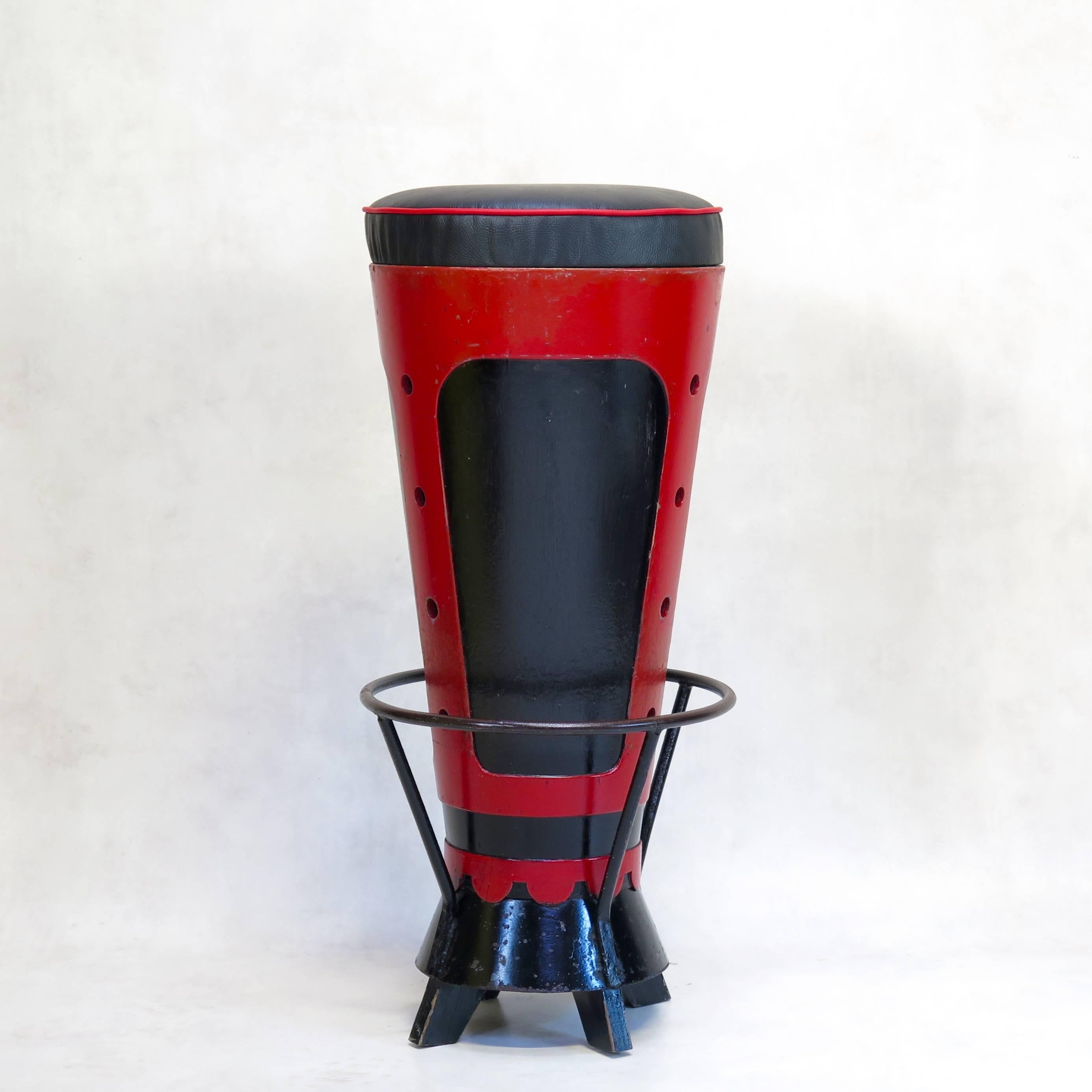 Fun and unique set of six bar stools, with a conical wooden structure painted in glossy red and black. The base is painted iron, as is the foot rail. 

Seats newly reupholstered in black vinyl with red piping.
