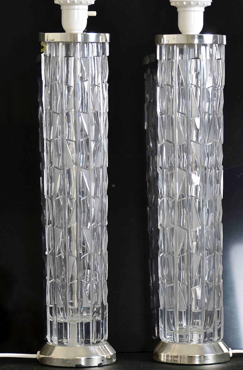 A pair of Bohemian crystal table lamps, produced by Bergboms, Sweden, circa 1960. Measures: Height 17