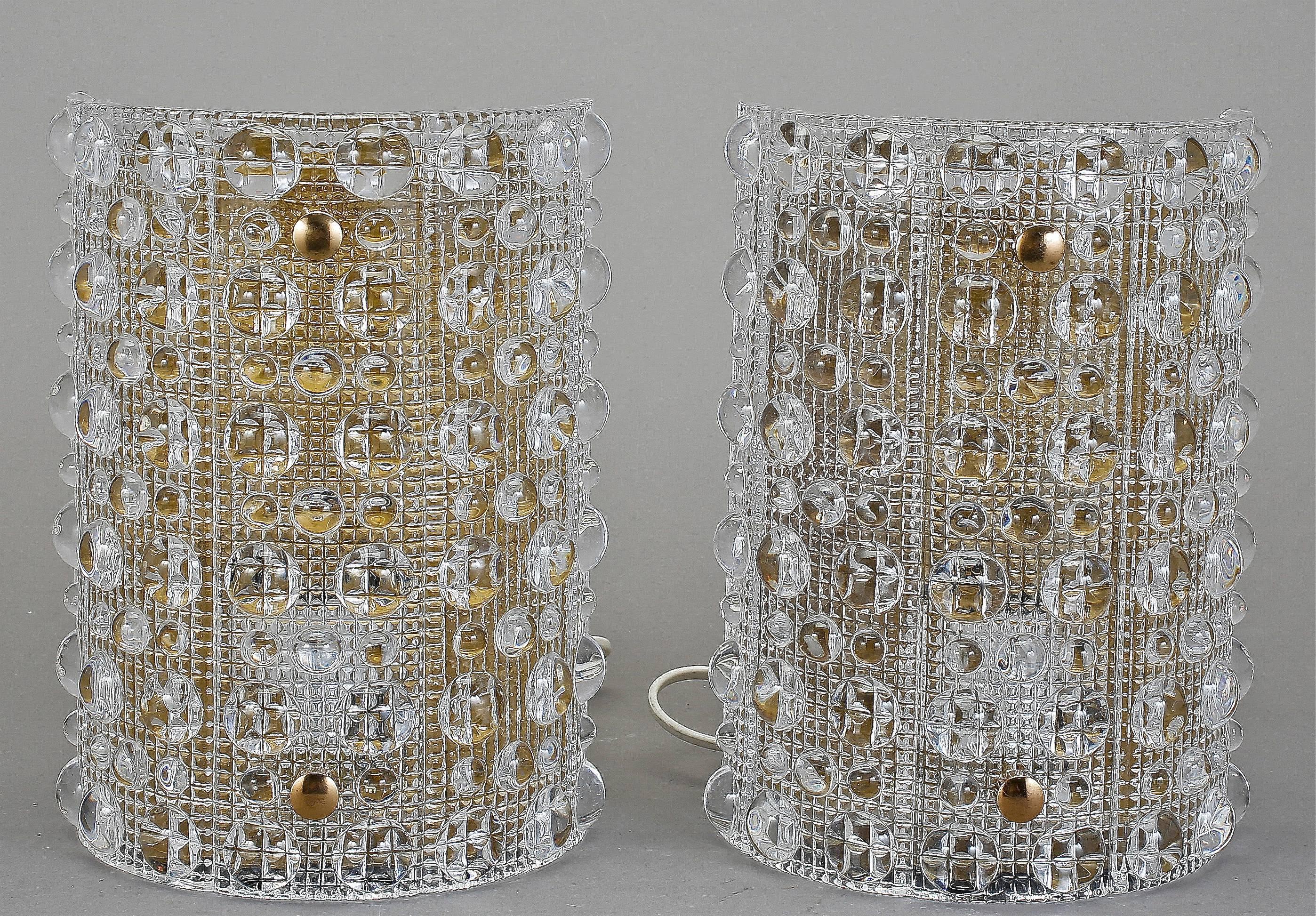 A pair of large wall lights designed by Carl Fagerlund for Orrefors, Sweden, circa 1970. Existing wiring, we do not guaranty functionality. Rewiring available upon request. Matching pendants also available.